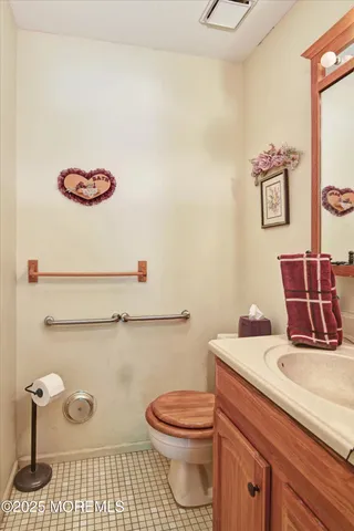 a bathroom with a toilet and a sink