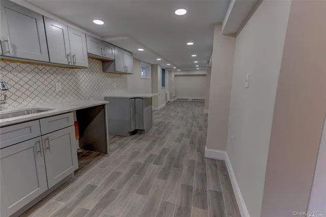 a view of kitchen with wooden floor