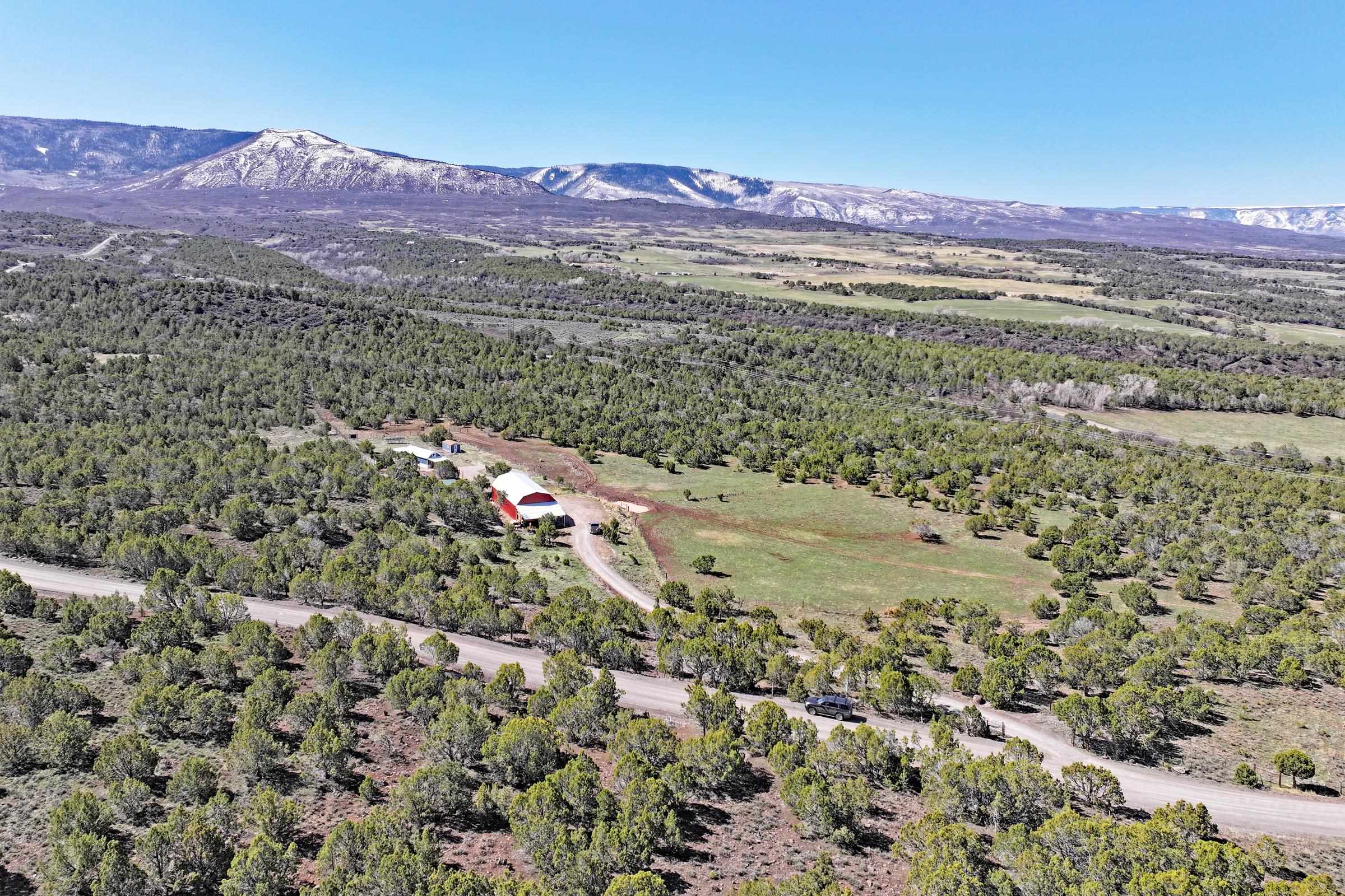 56001 KK Road Molina, CO 81646 - Photo 35 of 42 a view of a city with a mountain