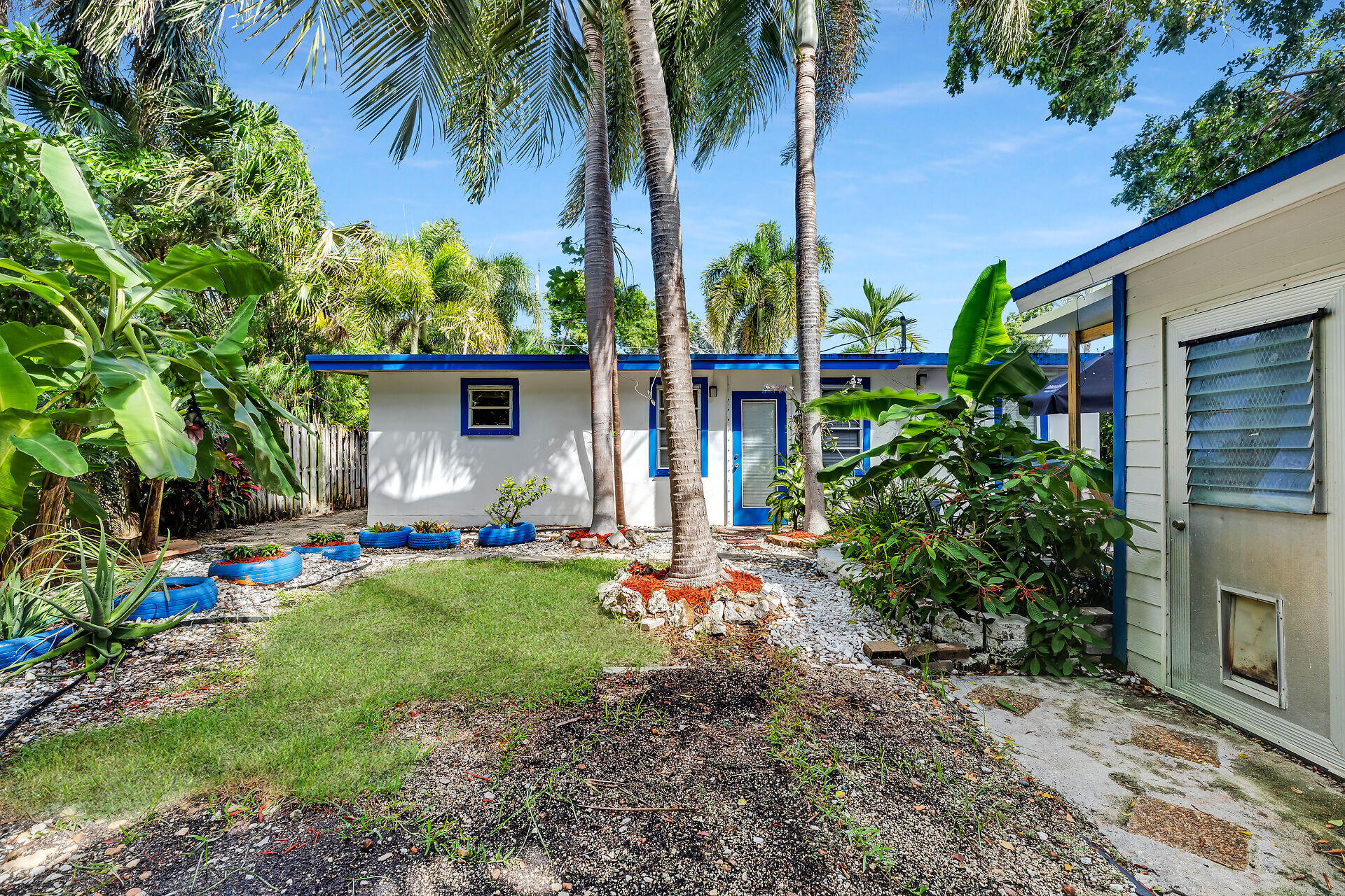 13 Bass Avenue Key Largo, FL 33037 - Photo 30 of 43 a front view of house with yard and seating space