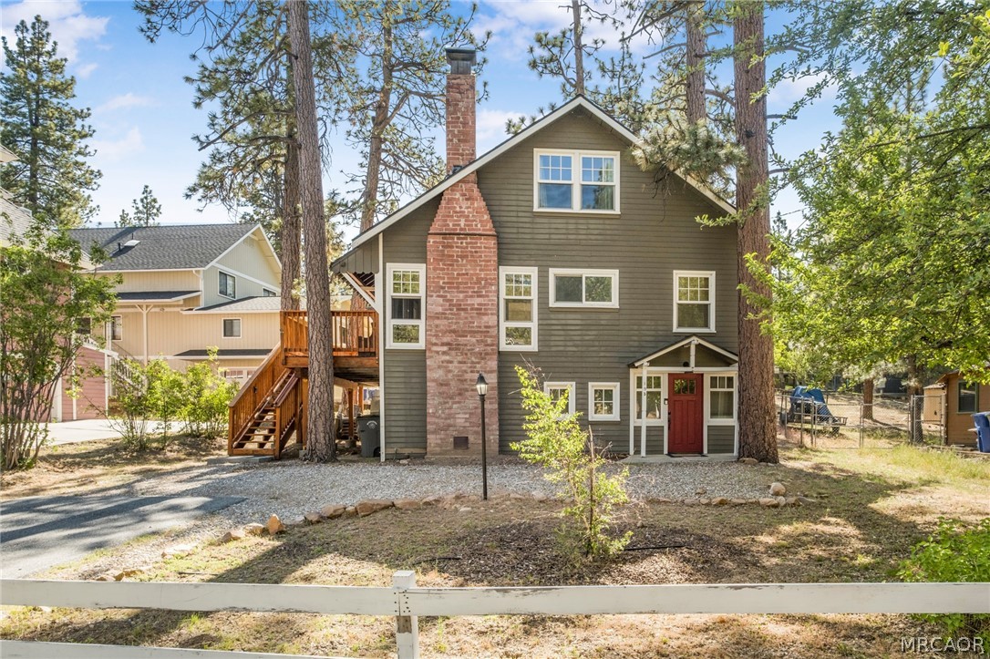 195 Elgin Road Big Bear Lake, CA 92315 - Photo 2 of 45 a front view of a house with a yard