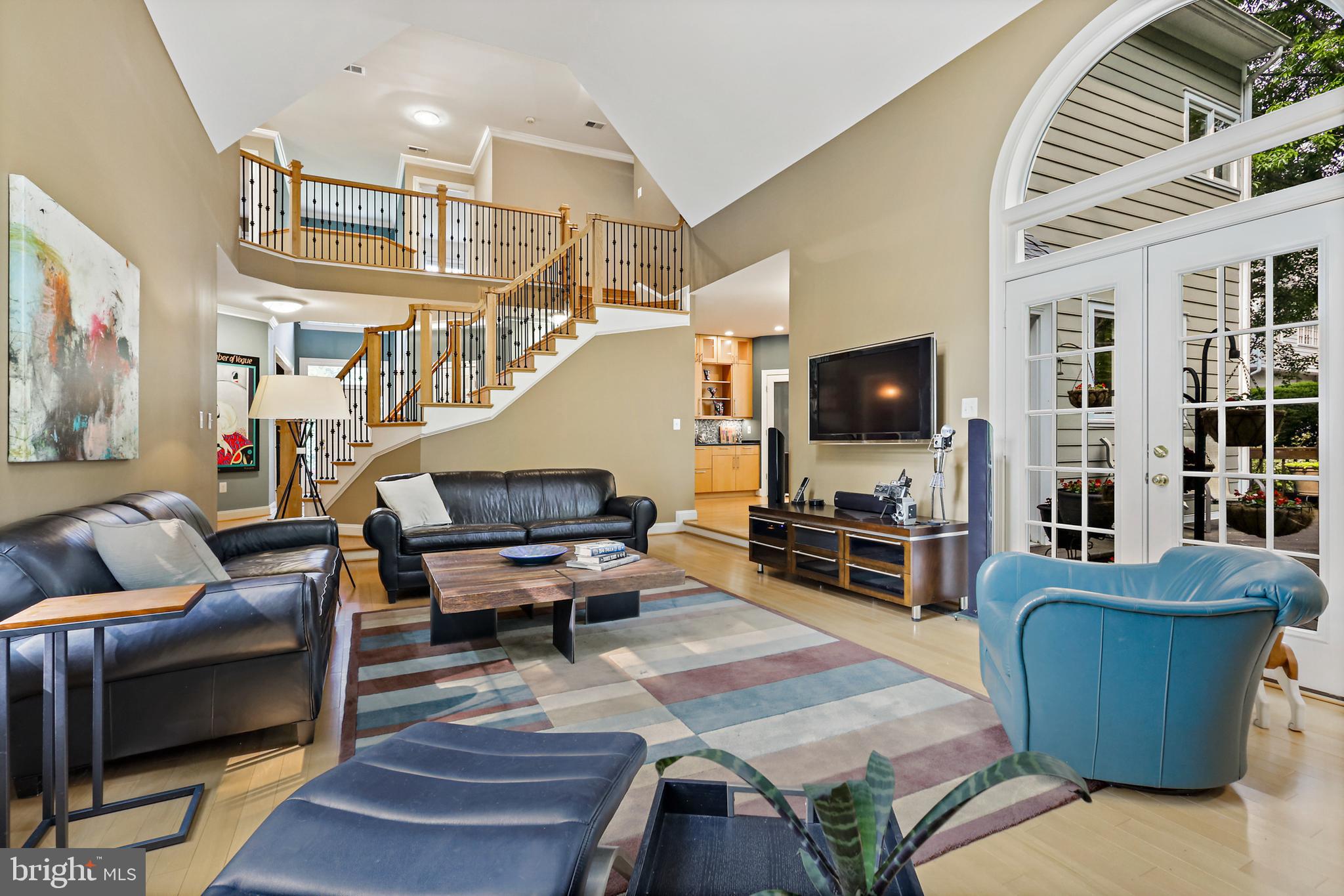 11406 Towering Oak Way Reston, VA 20194 - Photo 16 of 53 Deck access from double doors in family room