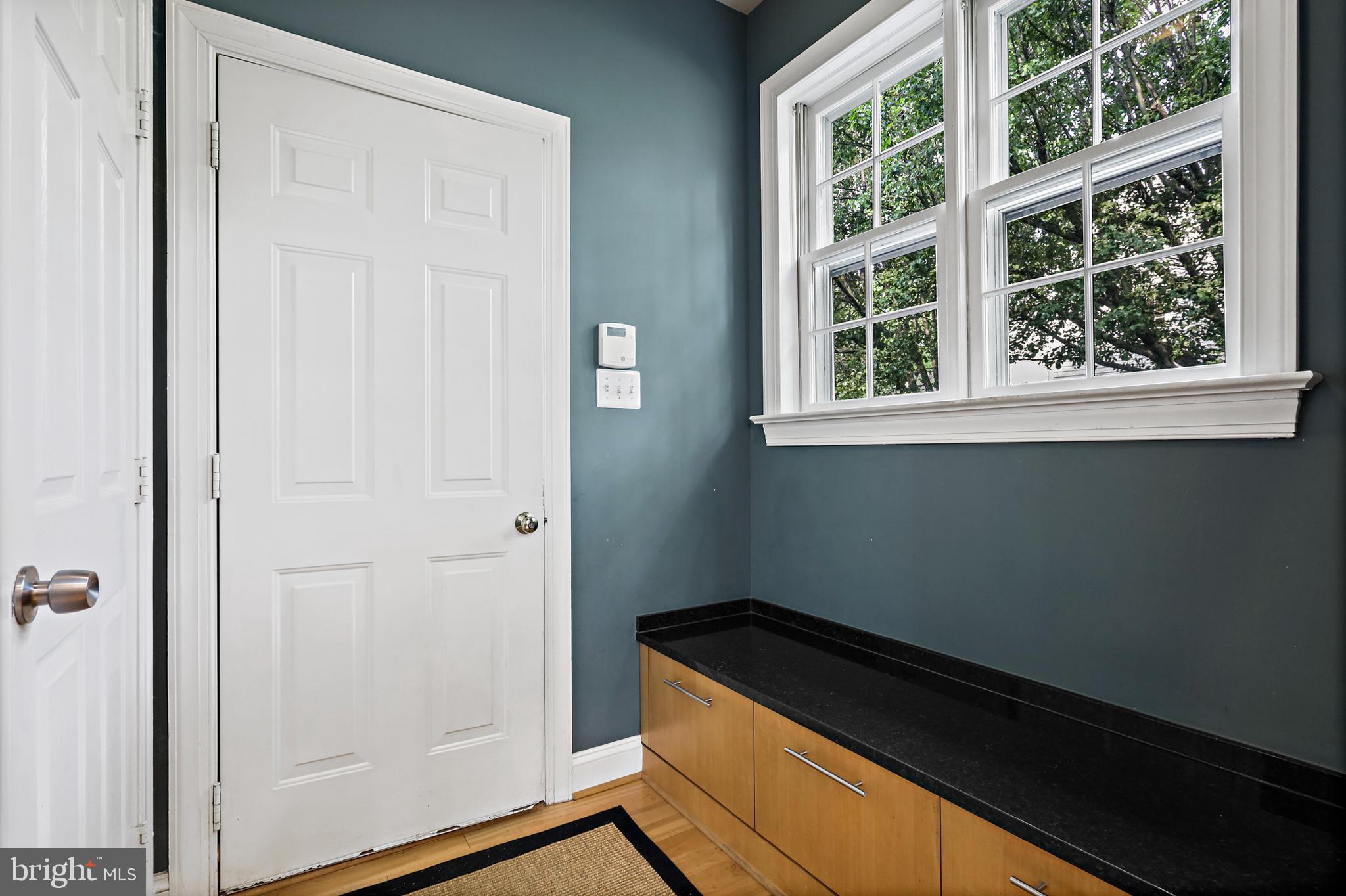 11406 Towering Oak Way Reston, VA 20194 - Photo 24 of 53 Mudroom has storage bench & coat closet