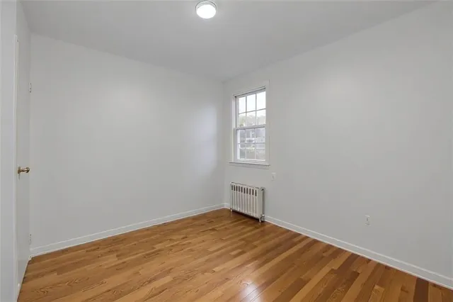 a bathroom with a toilet and shower