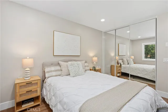 a bathroom with a toilet sink and shower