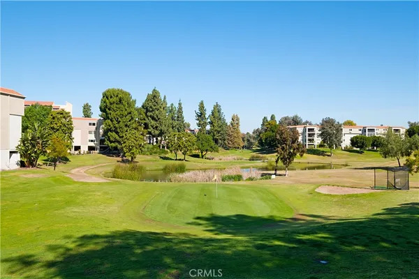 a view of a room with a yard and trees