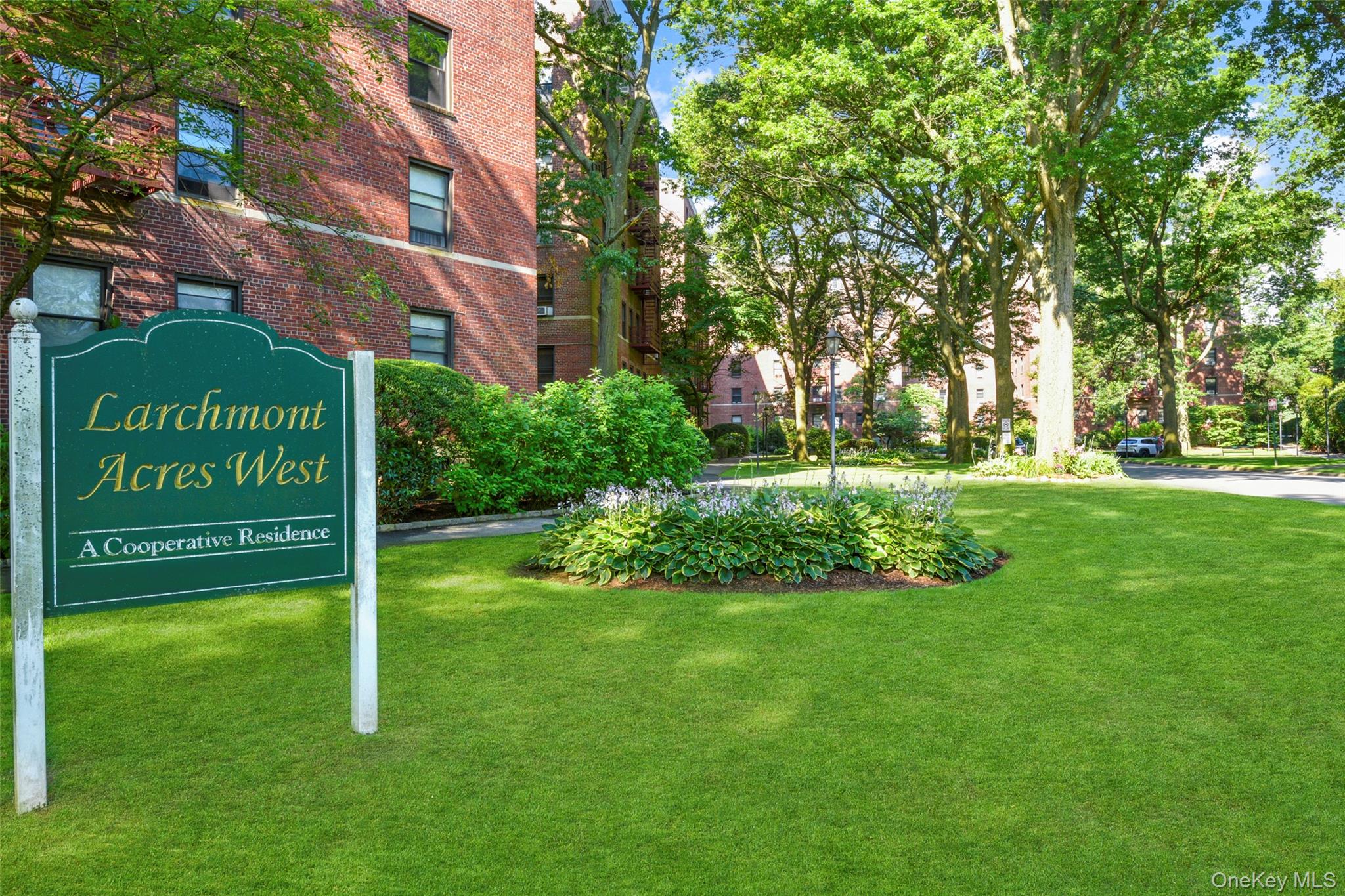 325 A Richbell Road, Unit 5A Mamaroneck, NY 10543 - Photo 1 of 1 a view of a sign in front of a brick building