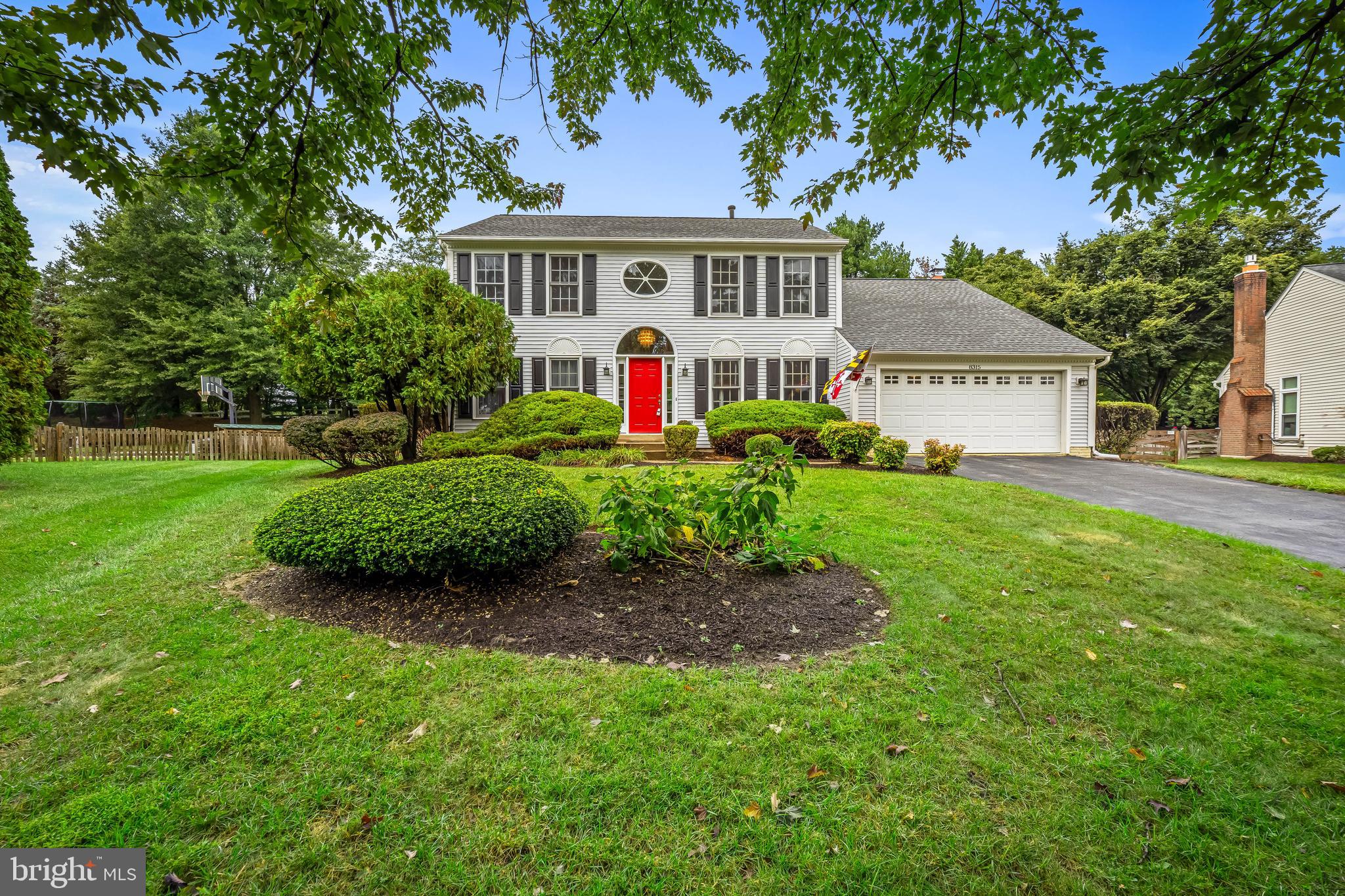8315 Saddle Ridge Terrace Ellicott City, MD 21043 - Photo 3 of 62 a view of a house with a small yard and palm trees