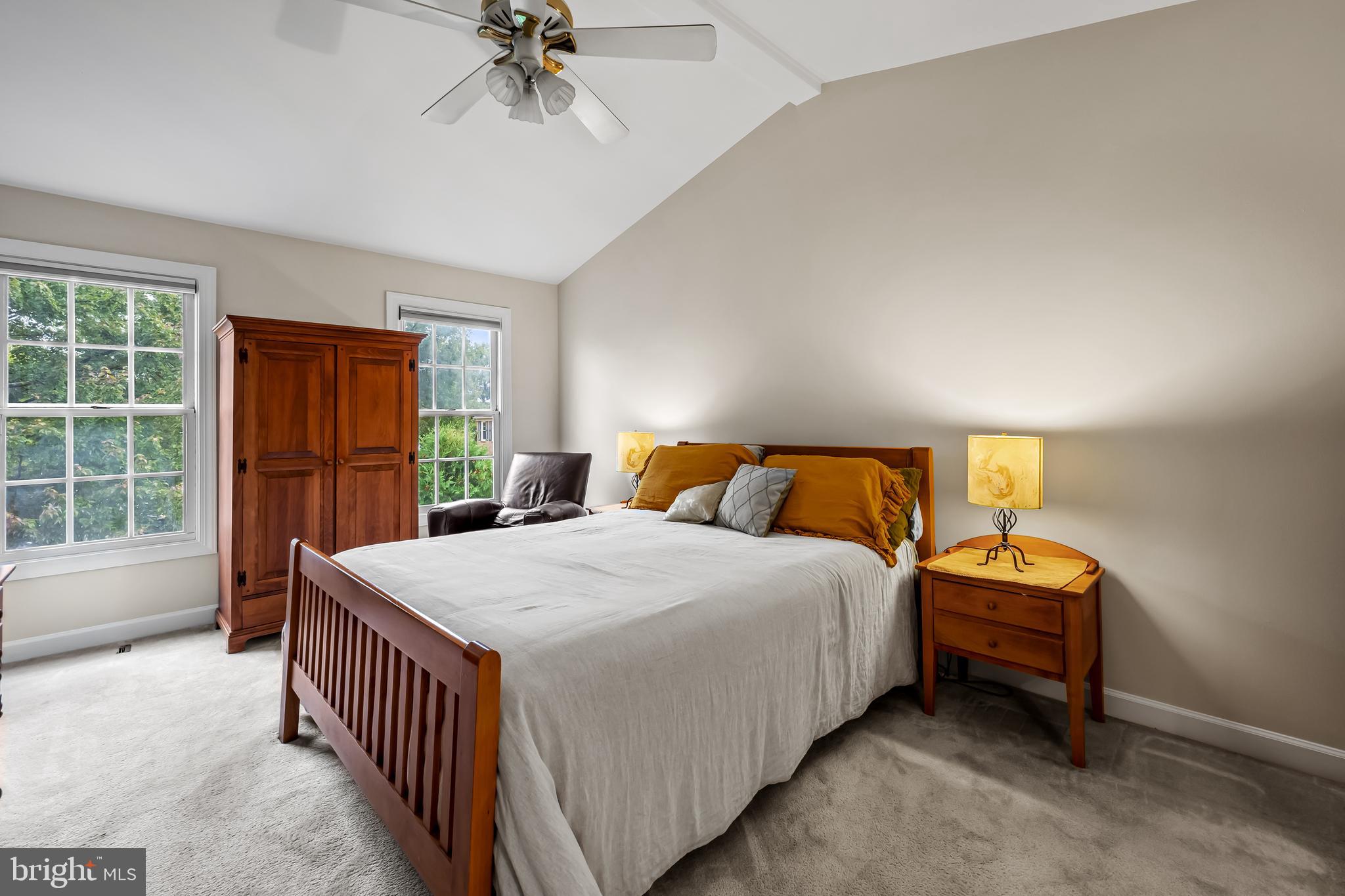 8315 Saddle Ridge Terrace Ellicott City, MD 21043 - Photo 35 of 62 a bed sitting in a bedroom next to a window