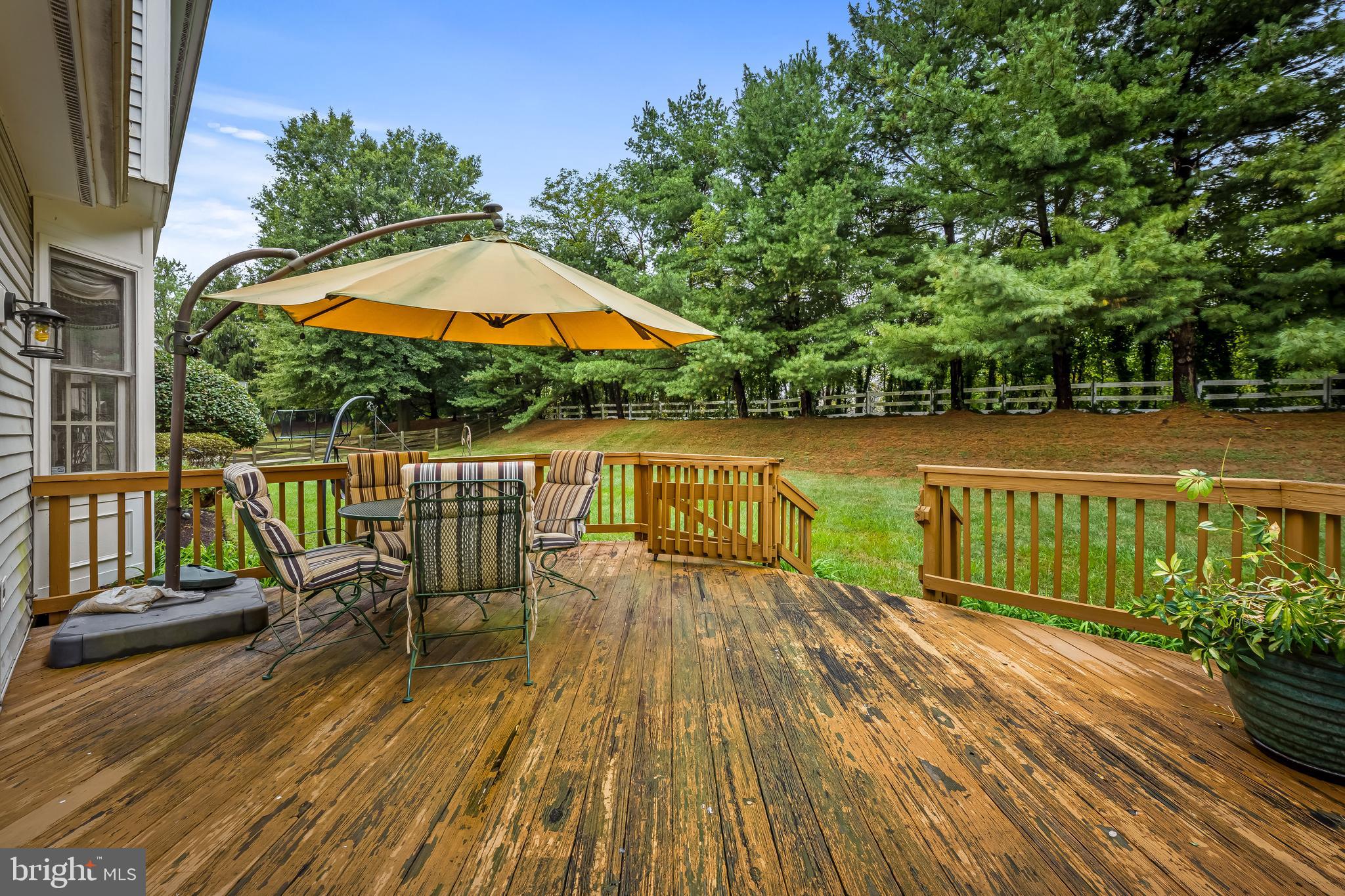 8315 Saddle Ridge Terrace Ellicott City, MD 21043 - Photo 46 of 62 a balcony with wooden floor and outdoor space