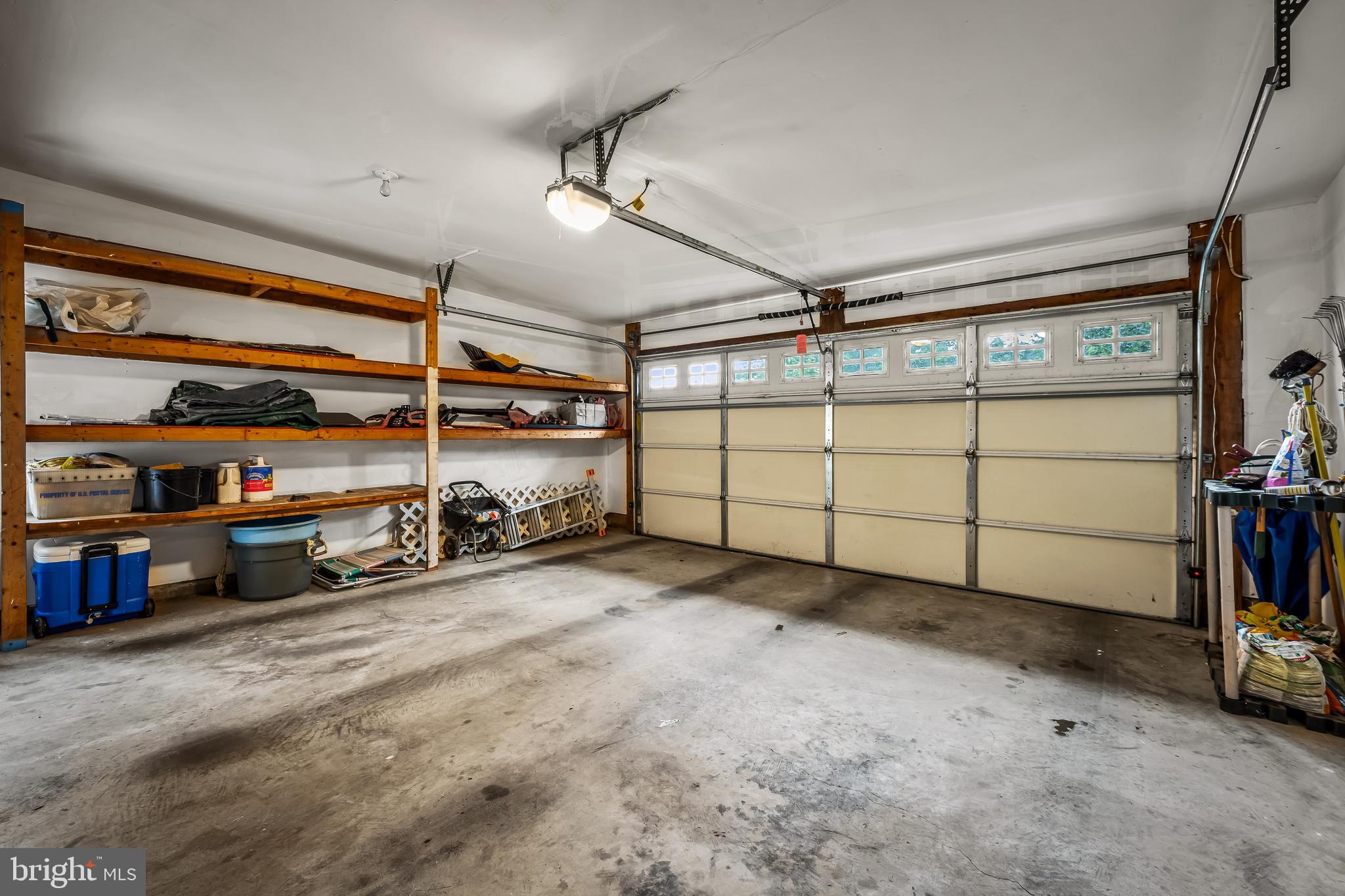 8315 Saddle Ridge Terrace Ellicott City, MD 21043 - Photo 52 of 62 a view of a garage with storage
