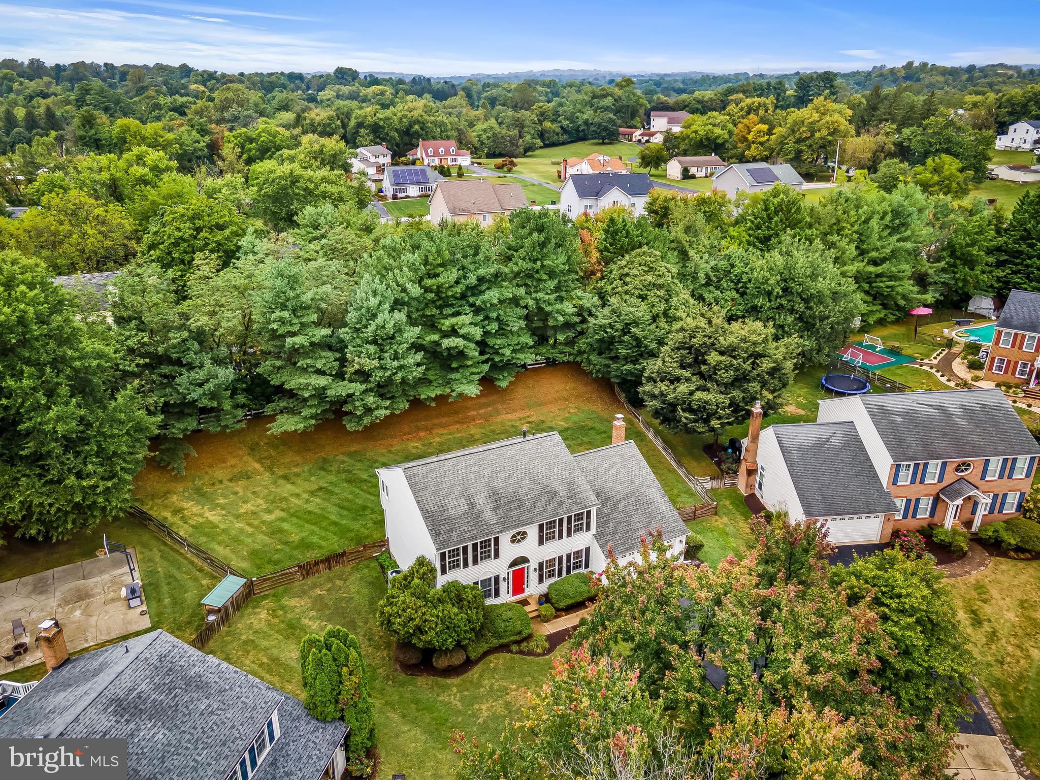 8315 Saddle Ridge Terrace Ellicott City, MD 21043 - Photo 54 of 62 an aerial view of a house with yard swimming pool and outdoor seating