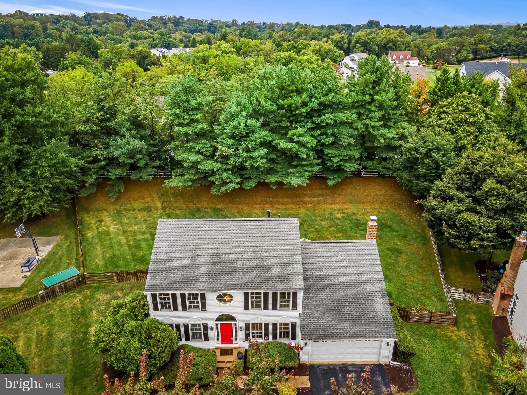 8315 Saddle Ridge Terrace Ellicott City, MD 21043 - Photo 55 of 62 an aerial view of a house with a yard basket ball court and outdoor seating