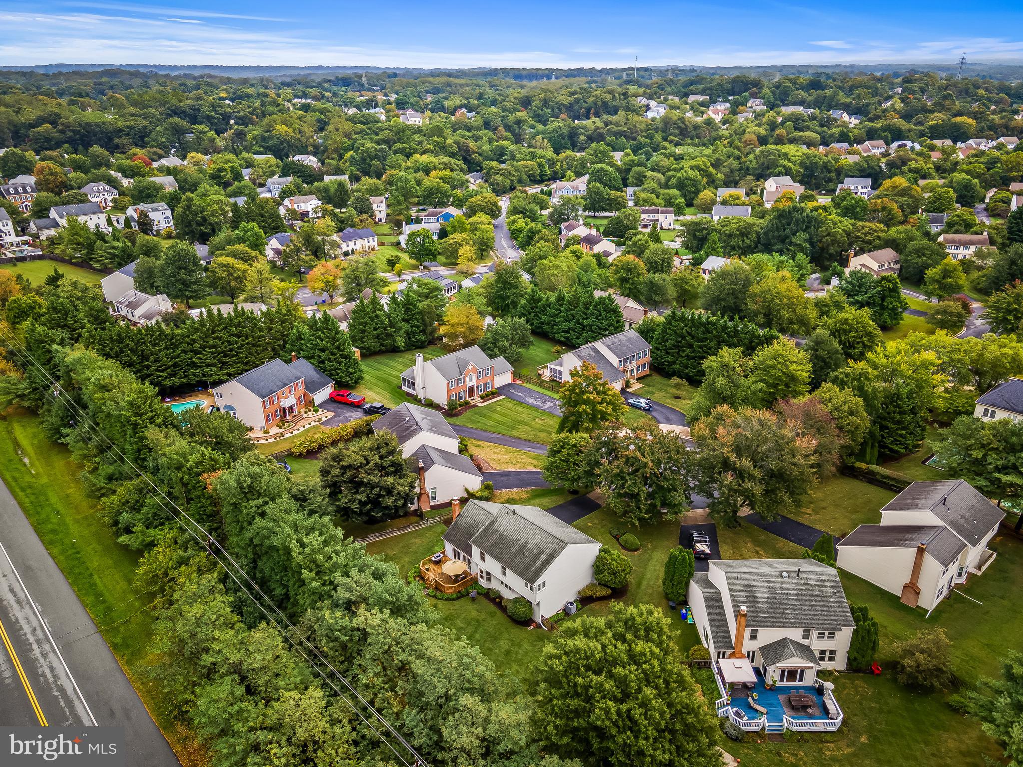 8315 Saddle Ridge Terrace Ellicott City, MD 21043 - Photo 57 of 62 an aerial view of a house with a yard