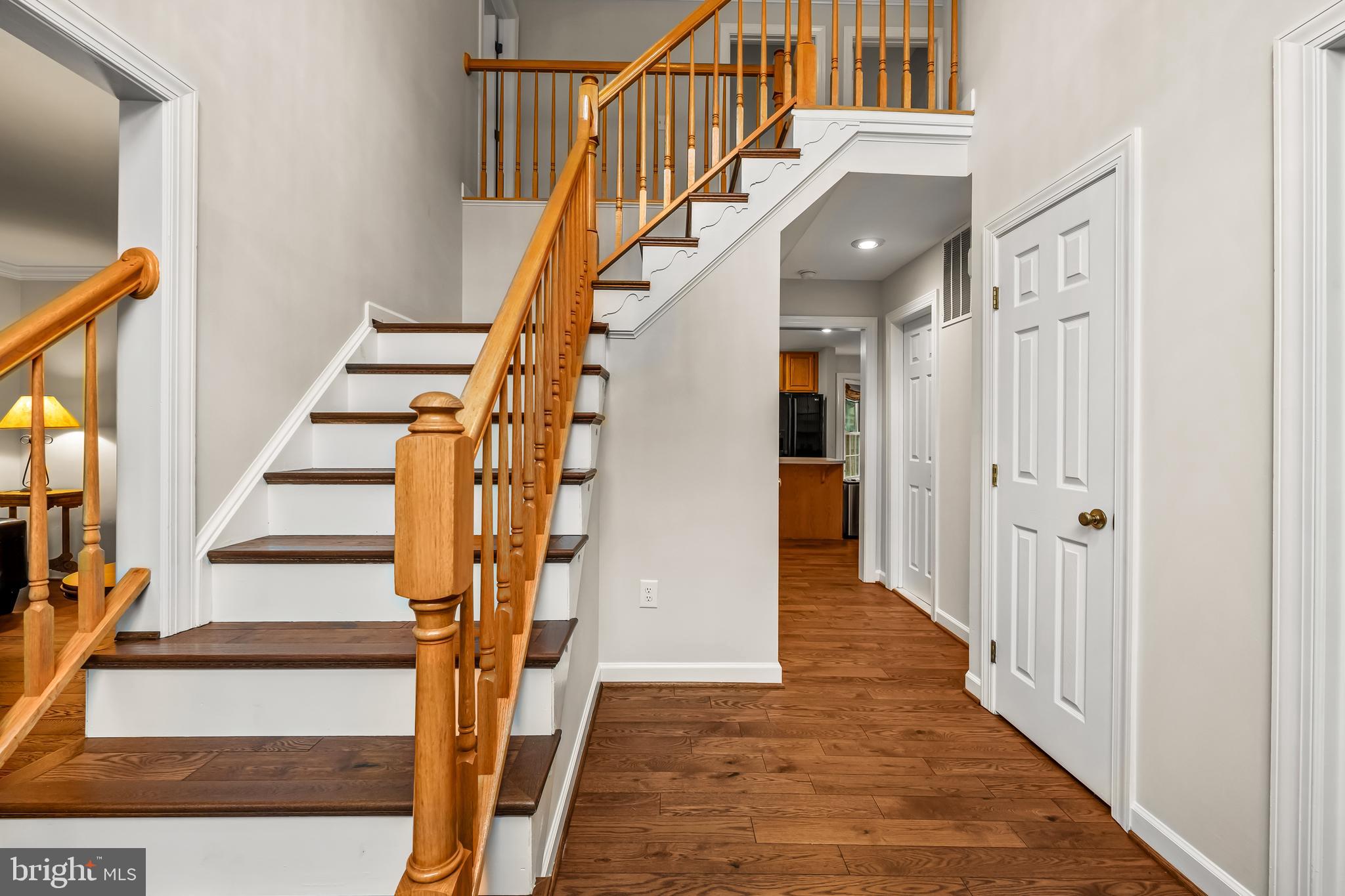 8315 Saddle Ridge Terrace Ellicott City, MD 21043 - Photo 6 of 62 a view of entryway and hall with wooden floor