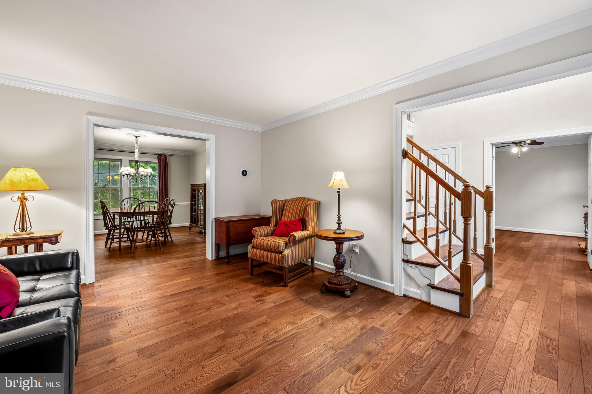 8315 Saddle Ridge Terrace Ellicott City, MD 21043 - Photo 10 of 62 a living room with furniture and a wooden floor