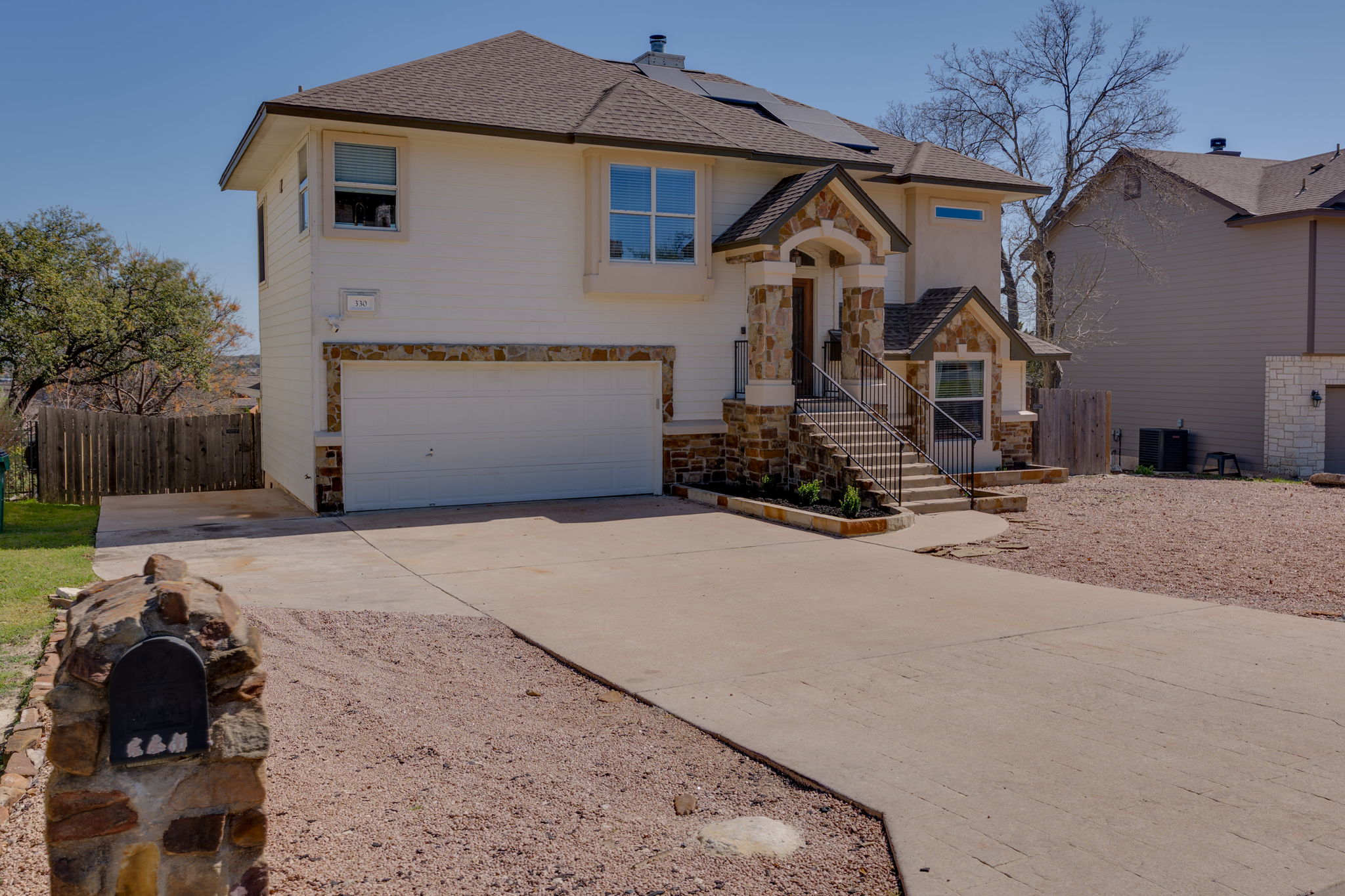 330 Southwind Road Point Venture, TX 78645 - Photo 5 of 37 Arrive, park, exhale. This one sits back for a little extra peace and quiet.