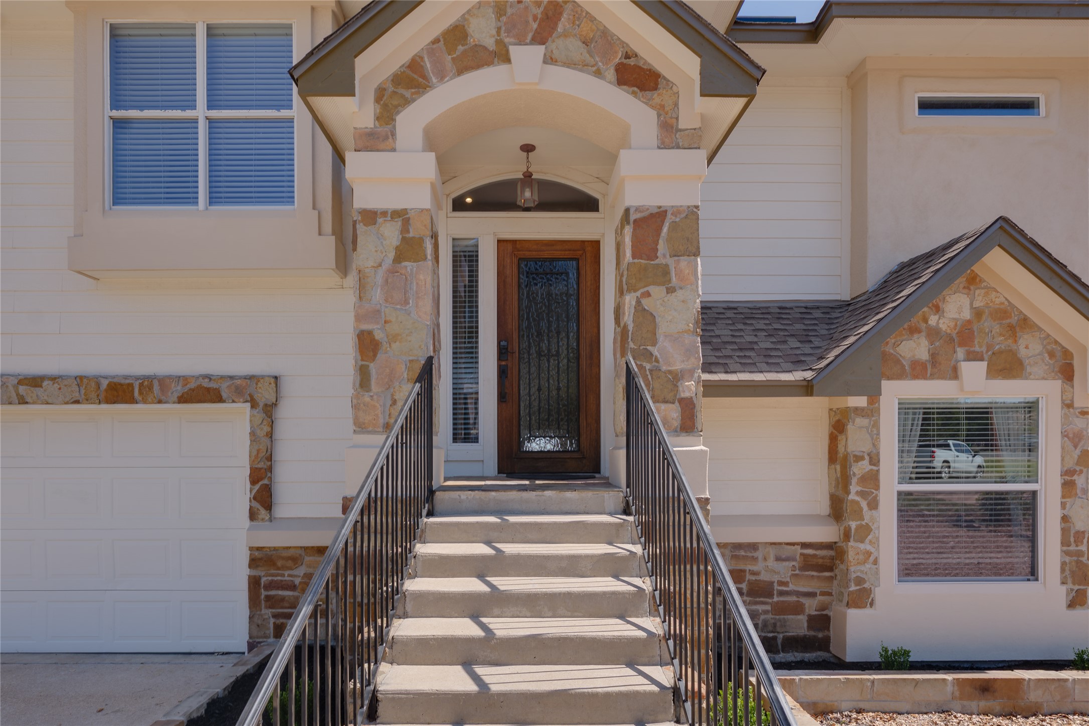 330 Southwind Road Point Venture, TX 78645 - Photo 6 of 37 Covered entry, solid curb appeal, and a front door that makes a good first impression without trying too hard.