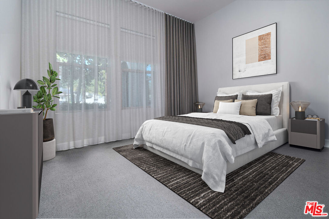 14608 McCormick Street Sherman Oaks, CA 91411 - Photo 11 of 29 a bedroom with bed and window