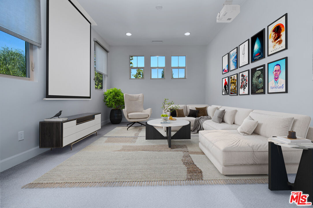14608 McCormick Street Sherman Oaks, CA 91411 - Photo 14 of 29 a living room with furniture and a book shelf