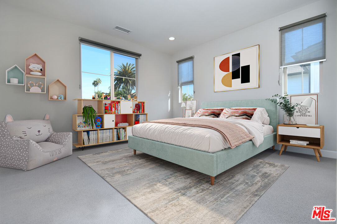 14608 McCormick Street Sherman Oaks, CA 91411 - Photo 15 of 29 a bedroom with a bed and furniture