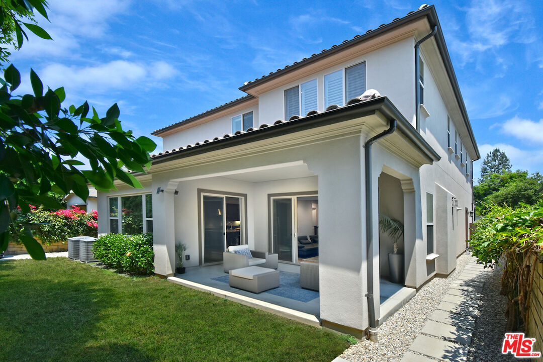 14608 McCormick Street Sherman Oaks, CA 91411 - Photo 29 of 29 a front view of a house with a porch