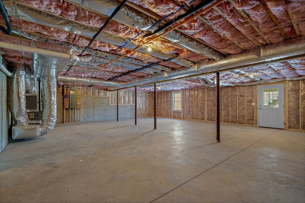 6 Chickadee Way, Unit 23 Upton, MA 01568 - Photo 35 of 41 a view of empty room with wooden ceiling