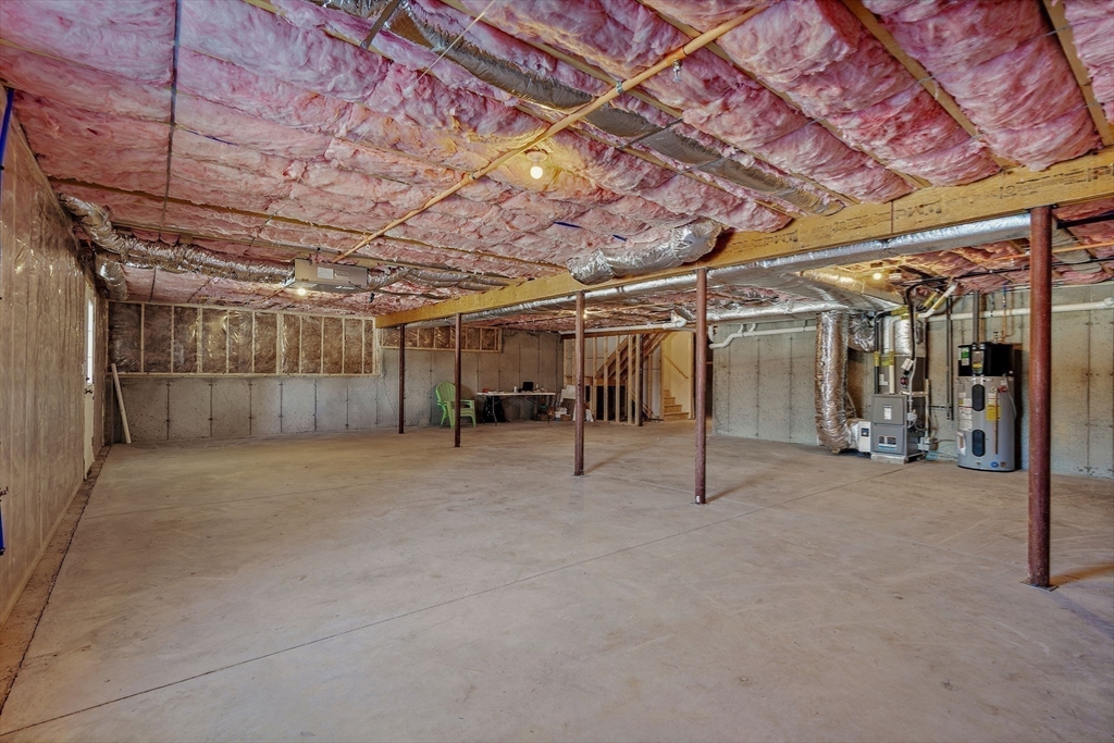 6 Chickadee Way, Unit 23 Upton, MA 01568 - Photo 36 of 41 a view of empty room with wooden ceiling