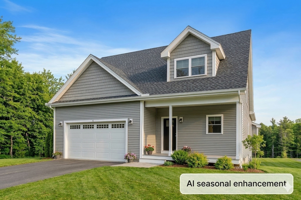 6 Chickadee Way, Unit 23 Upton, MA 01568 - Photo 37 of 40 a front view of a house with a yard