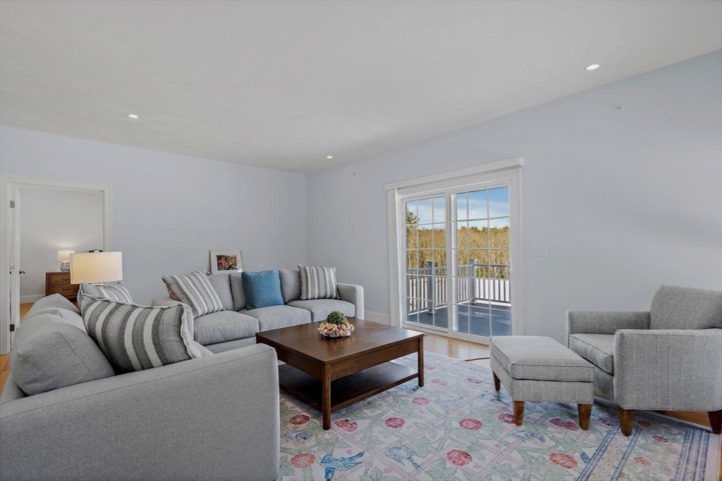 6 Chickadee Way, Unit 23 Upton, MA 01568 - Photo 8 of 41 a living room with furniture and a window