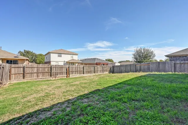 a view of a car park in front of a building