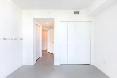 a view of a room with an empty space