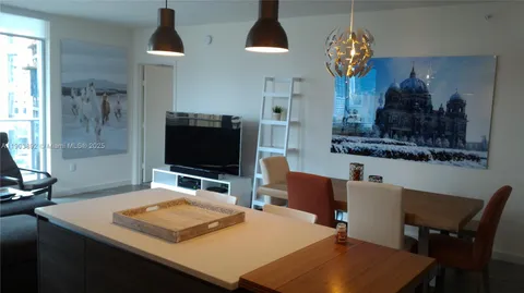 a room with table and chairs