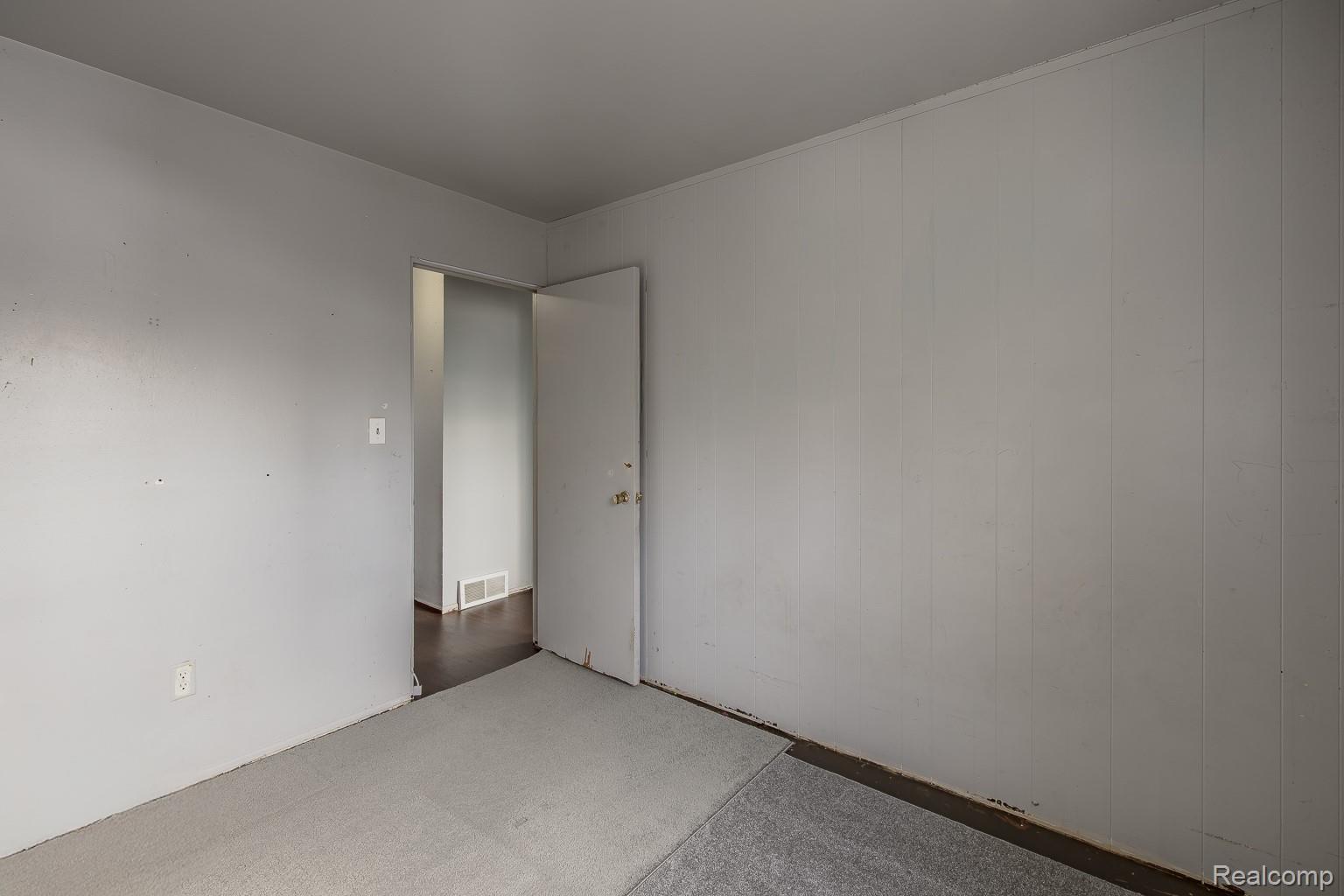 8670 North Eston Road Clarkston, MI 48348 - Photo 11 of 29 Empty room with carpet