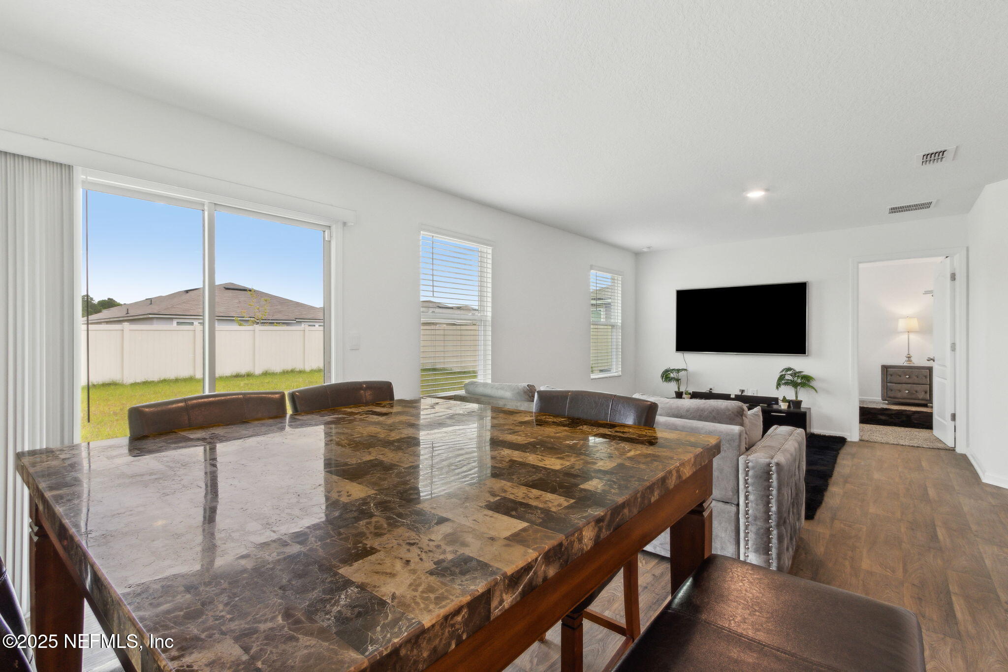 12647 European Beech Road Jacksonville, FL 32218 - Photo 13 of 28 a living room with furniture and a flat screen tv