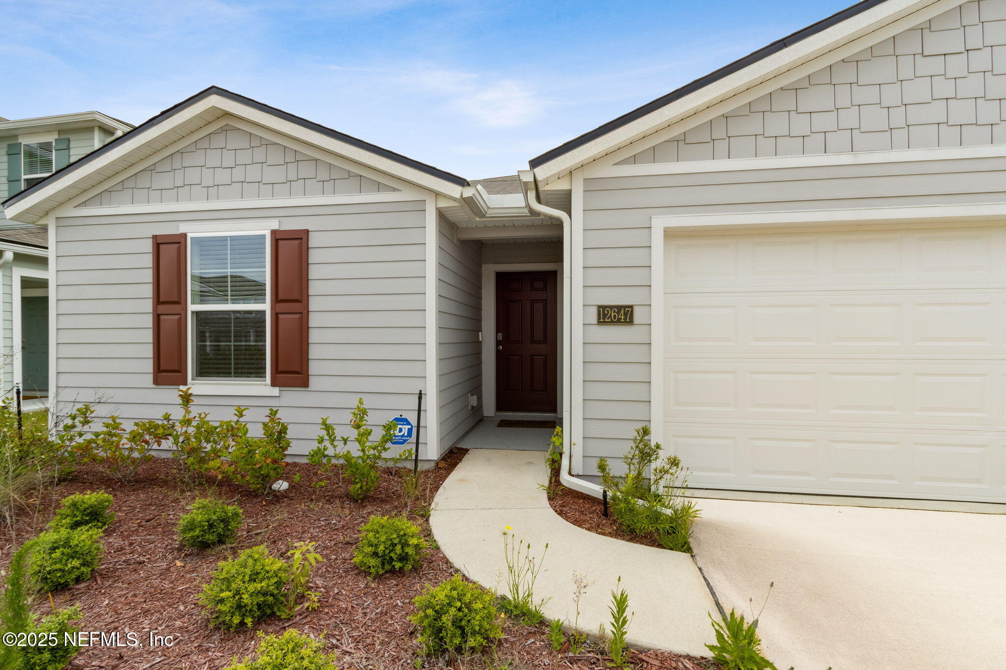 12647 European Beech Road Jacksonville, FL 32218 - Photo 2 of 28 a front view of a house