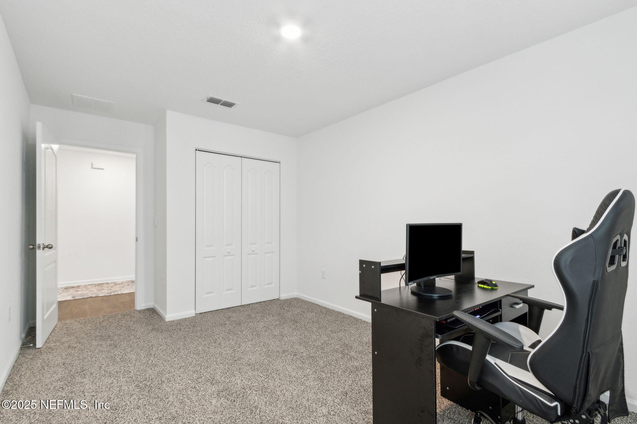 12647 European Beech Road Jacksonville, FL 32218 - Photo 25 of 28 a view of a workspace with furniture