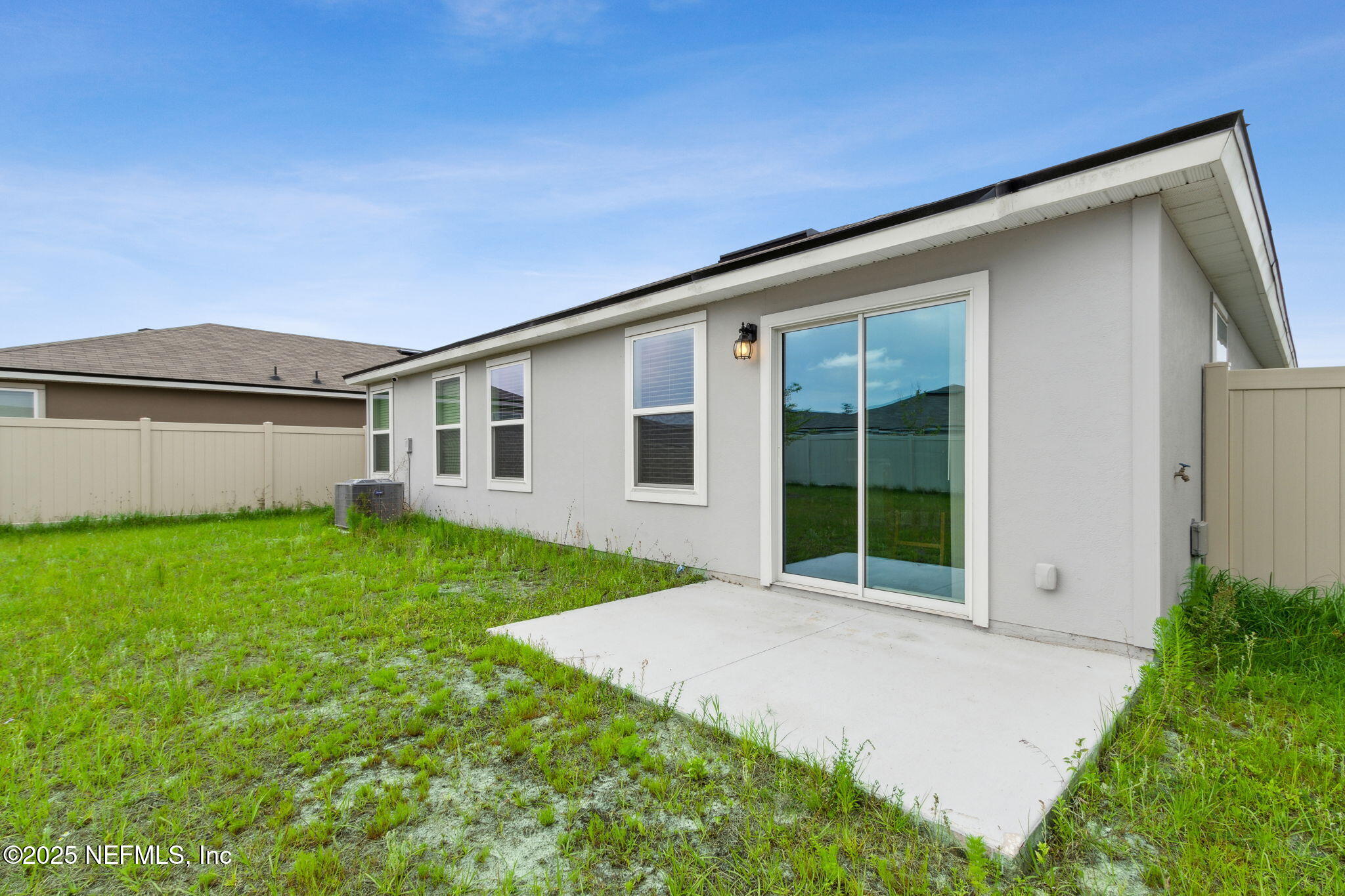 12647 European Beech Road Jacksonville, FL 32218 - Photo 27 of 28 a view of a house with a backyard