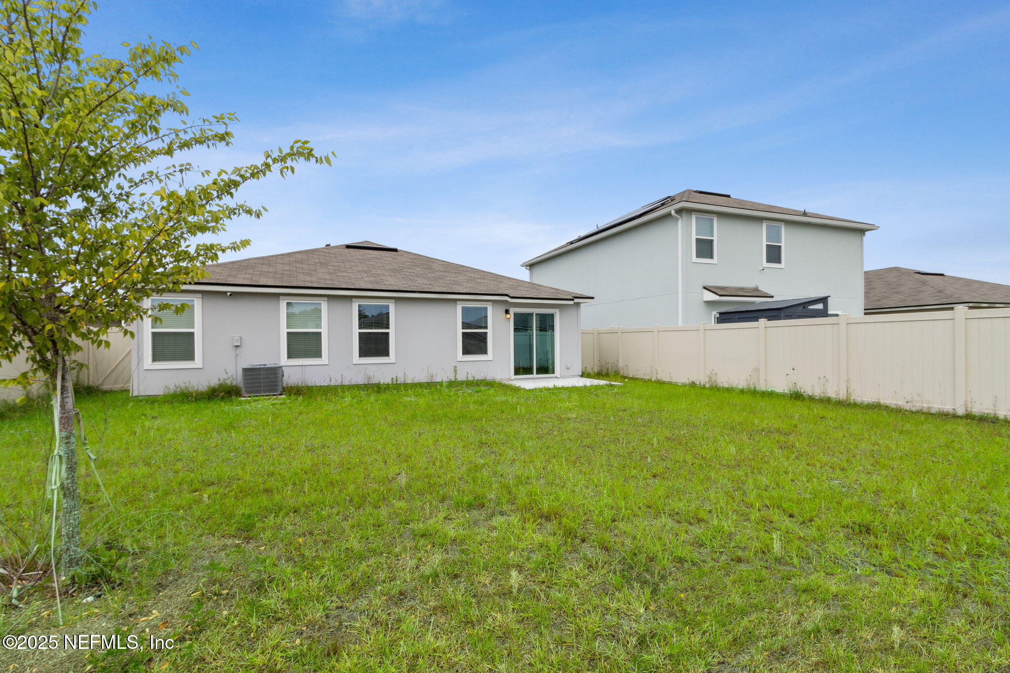 12647 European Beech Road Jacksonville, FL 32218 - Photo 28 of 28 a front view of a house with a garden