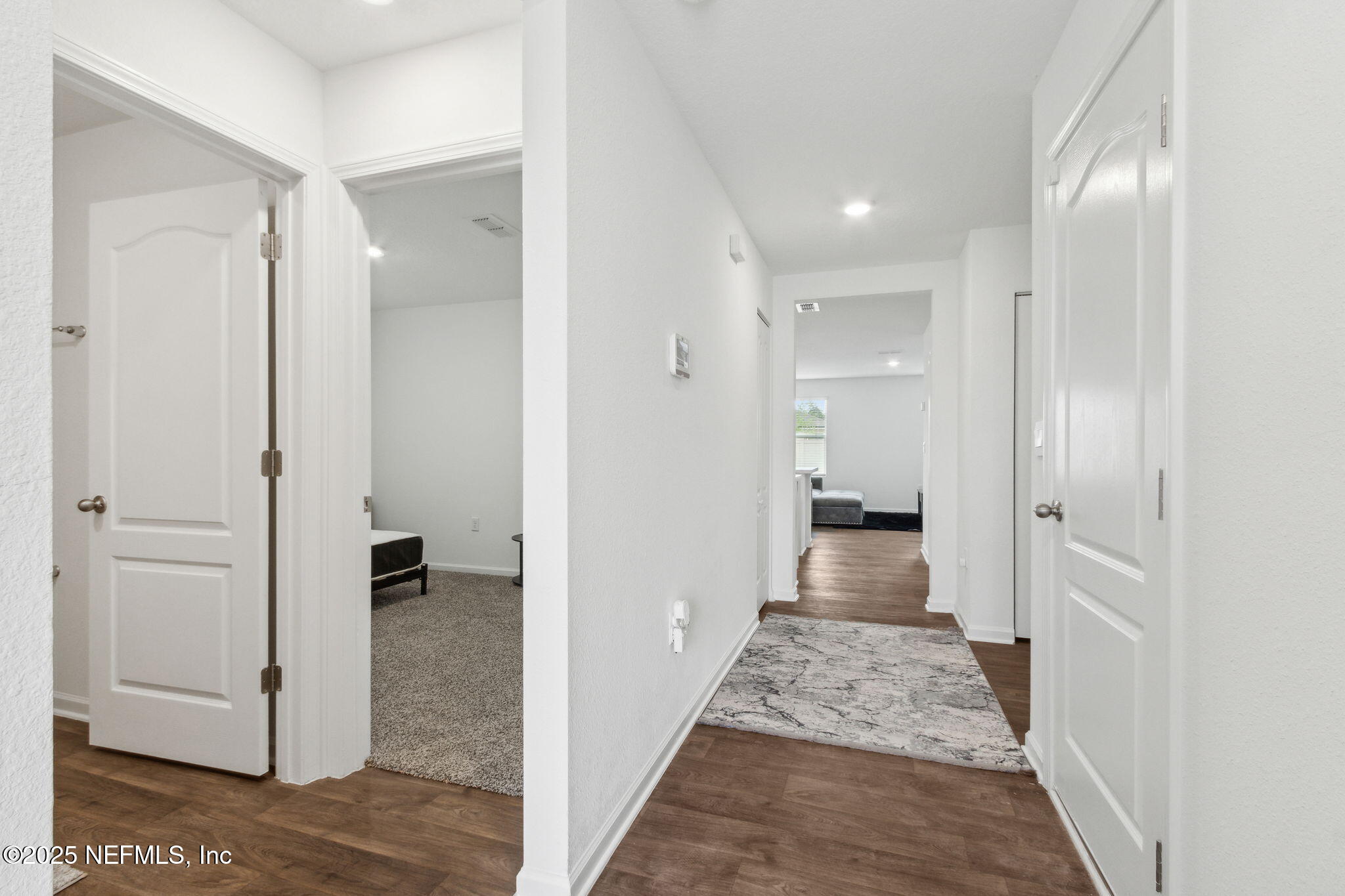 12647 European Beech Road Jacksonville, FL 32218 - Photo 3 of 28 a view of hallway with wooden floor