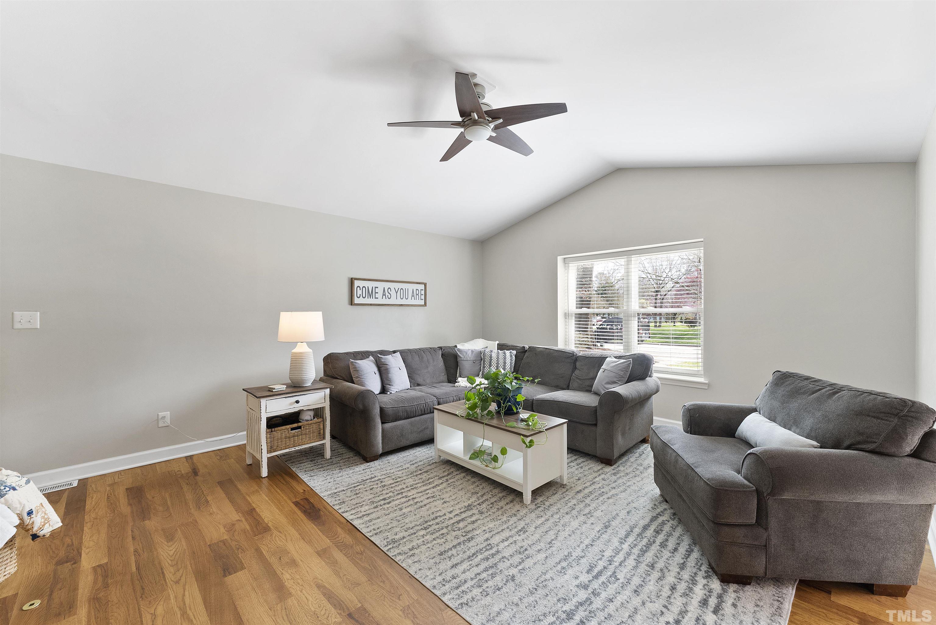 5413 Old Towne Road Raleigh, NC 27612 - Photo 9 of 34 a living room with furniture and a window