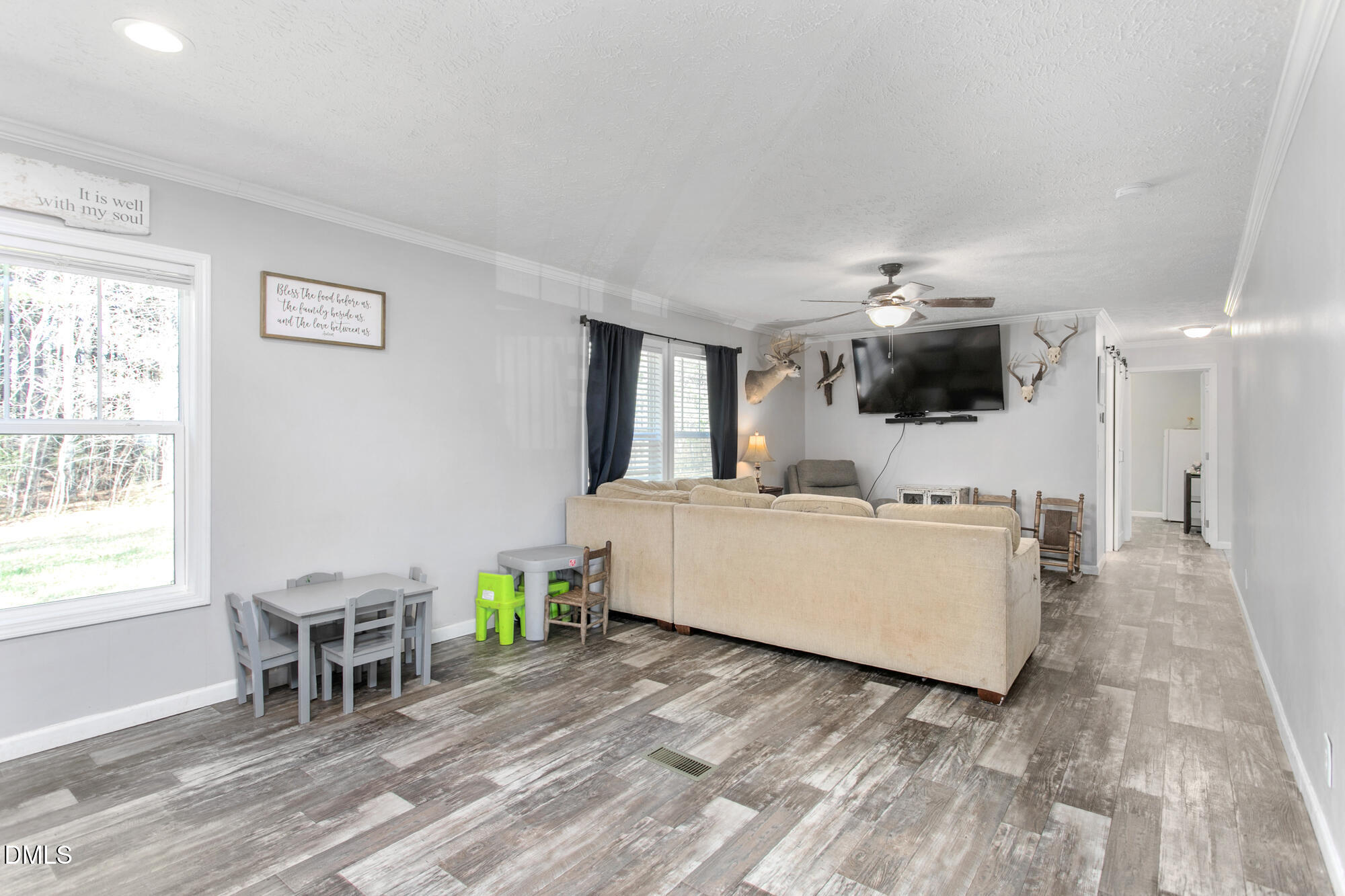 578 Brintle Road Reidsville, NC 27320 - Photo 12 of 37 a living room with furniture and a flat screen tv