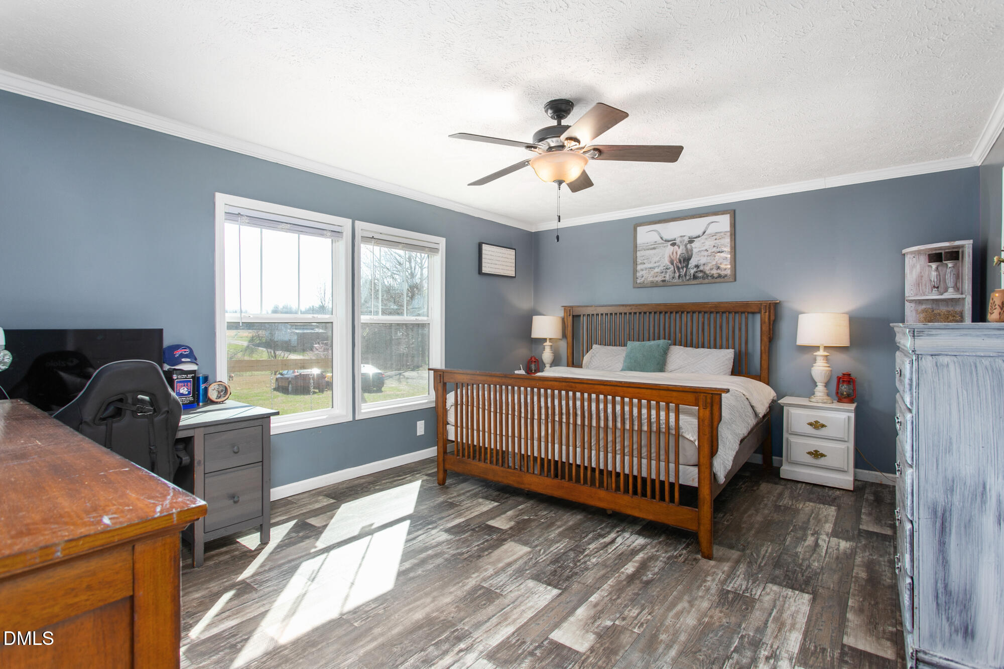 578 Brintle Road Reidsville, NC 27320 - Photo 14 of 37 a bedroom with a bed and a large window