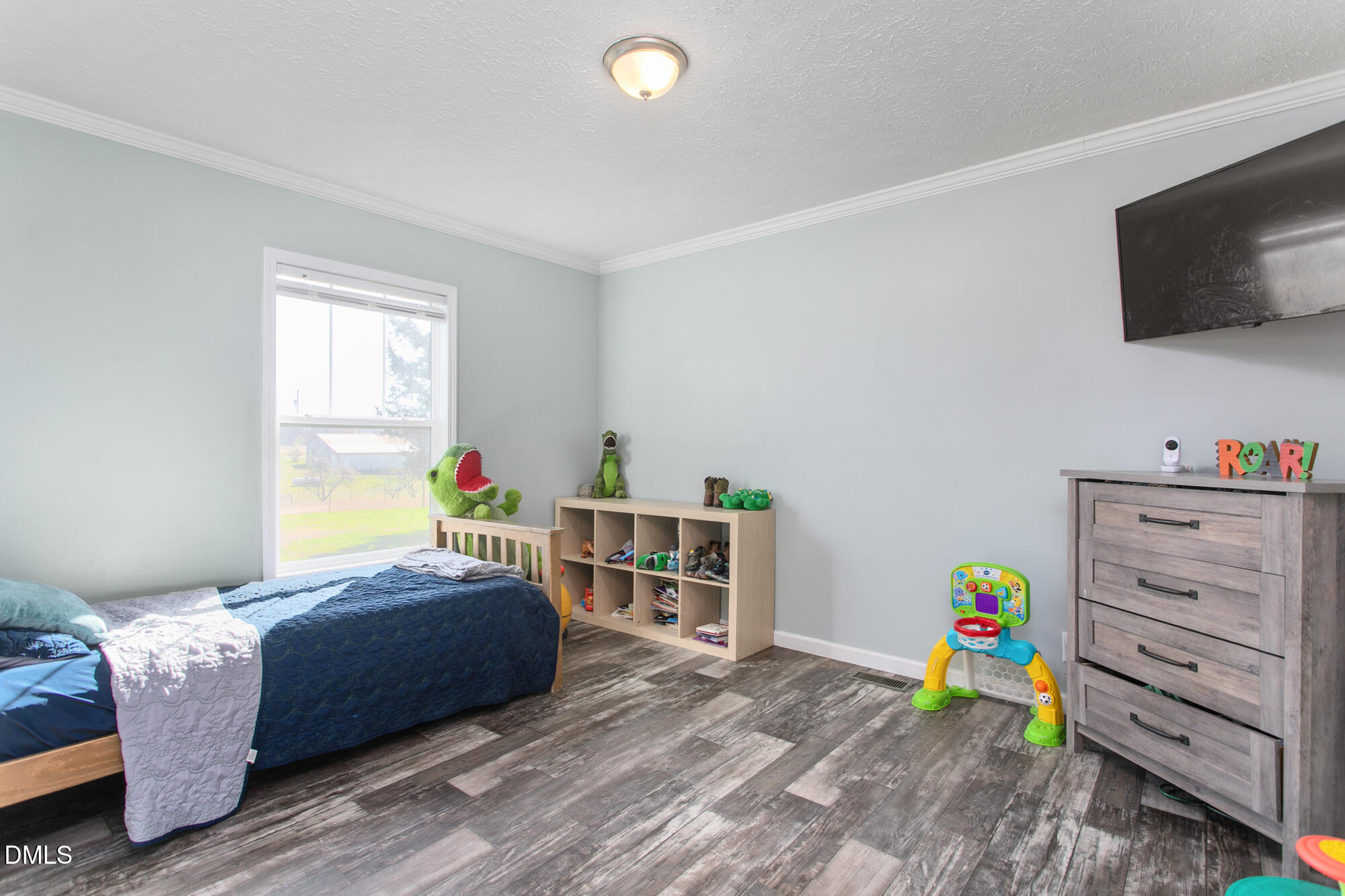 578 Brintle Road Reidsville, NC 27320 - Photo 23 of 37 a bedroom with a bed and a window