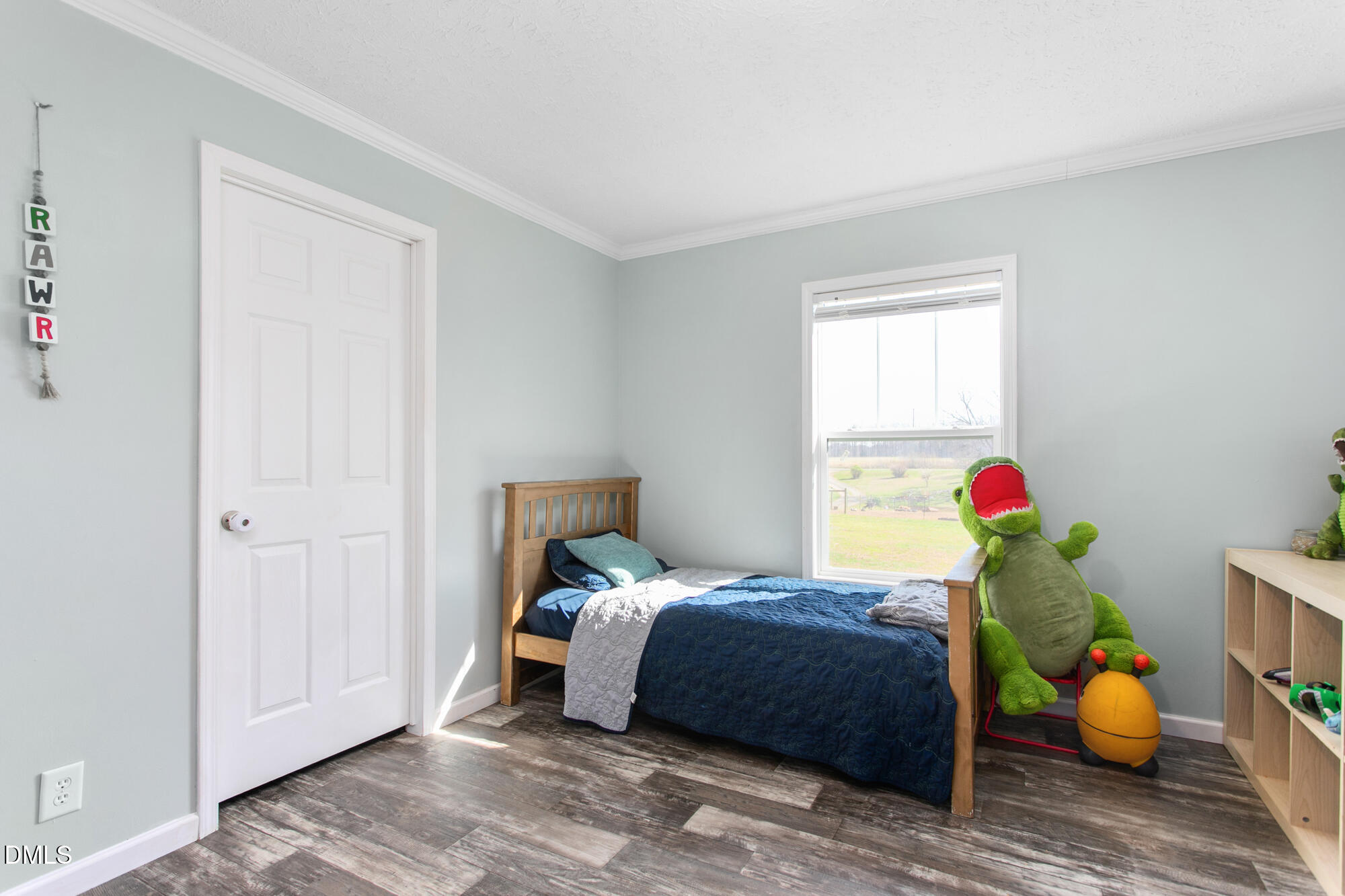 578 Brintle Road Reidsville, NC 27320 - Photo 24 of 37 a bedroom with a bed and a window