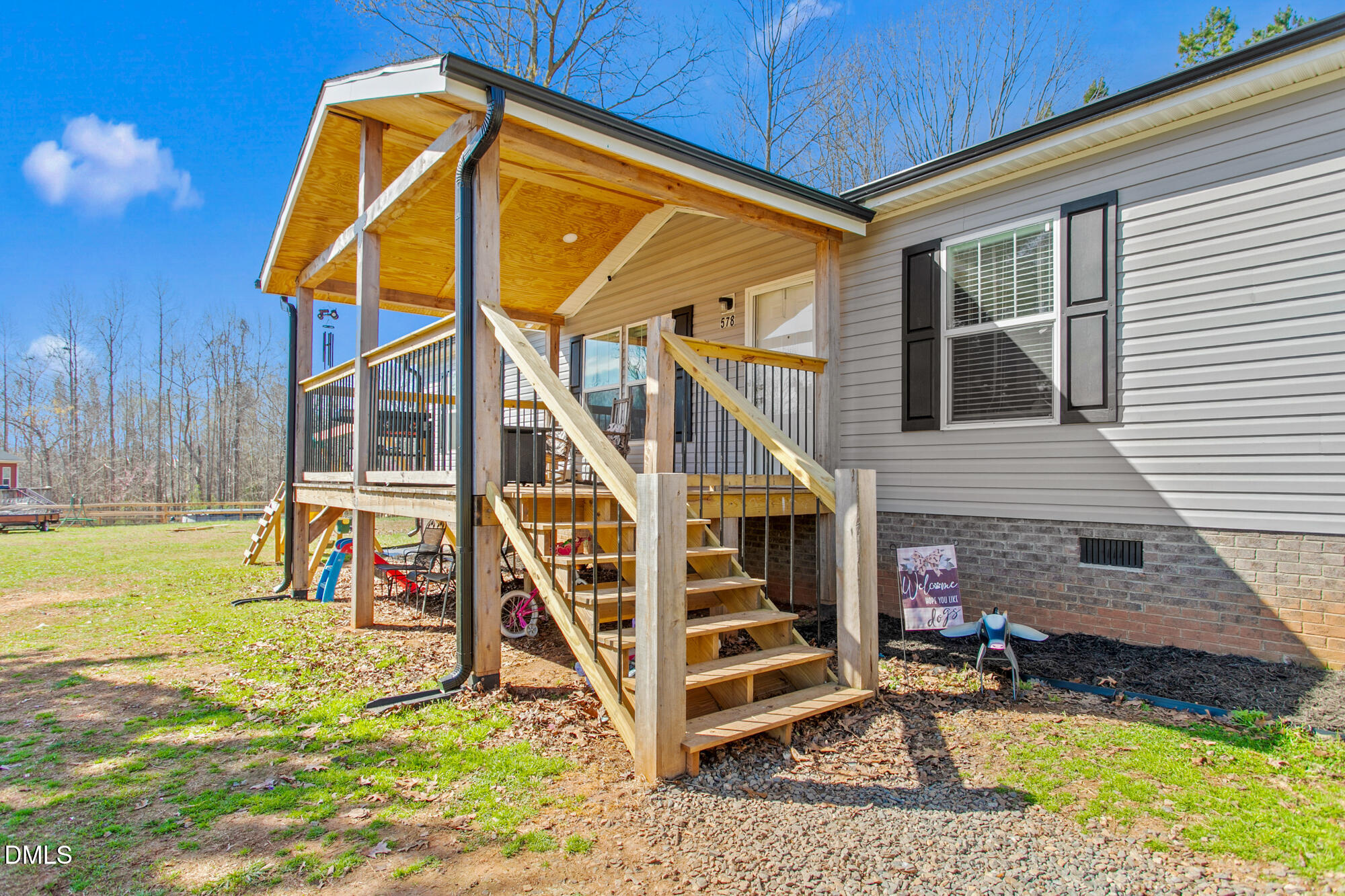 578 Brintle Road Reidsville, NC 27320 - Photo 3 of 37 a view of a house with backyard and deck
