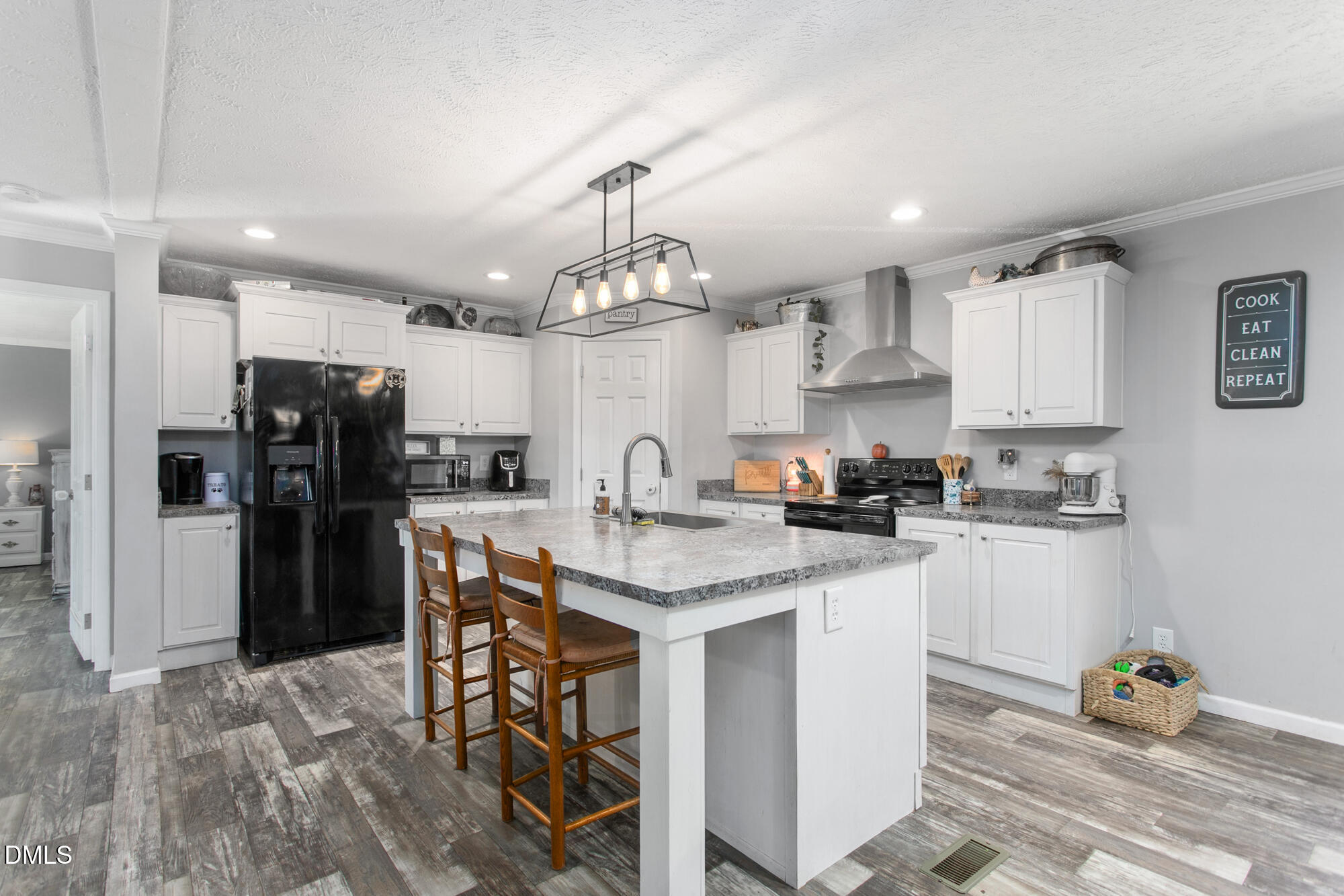578 Brintle Road Reidsville, NC 27320 - Photo 9 of 37 a kitchen with stainless steel appliances granite countertop a refrigerator oven a sink dishwasher and a stove with wooden floor