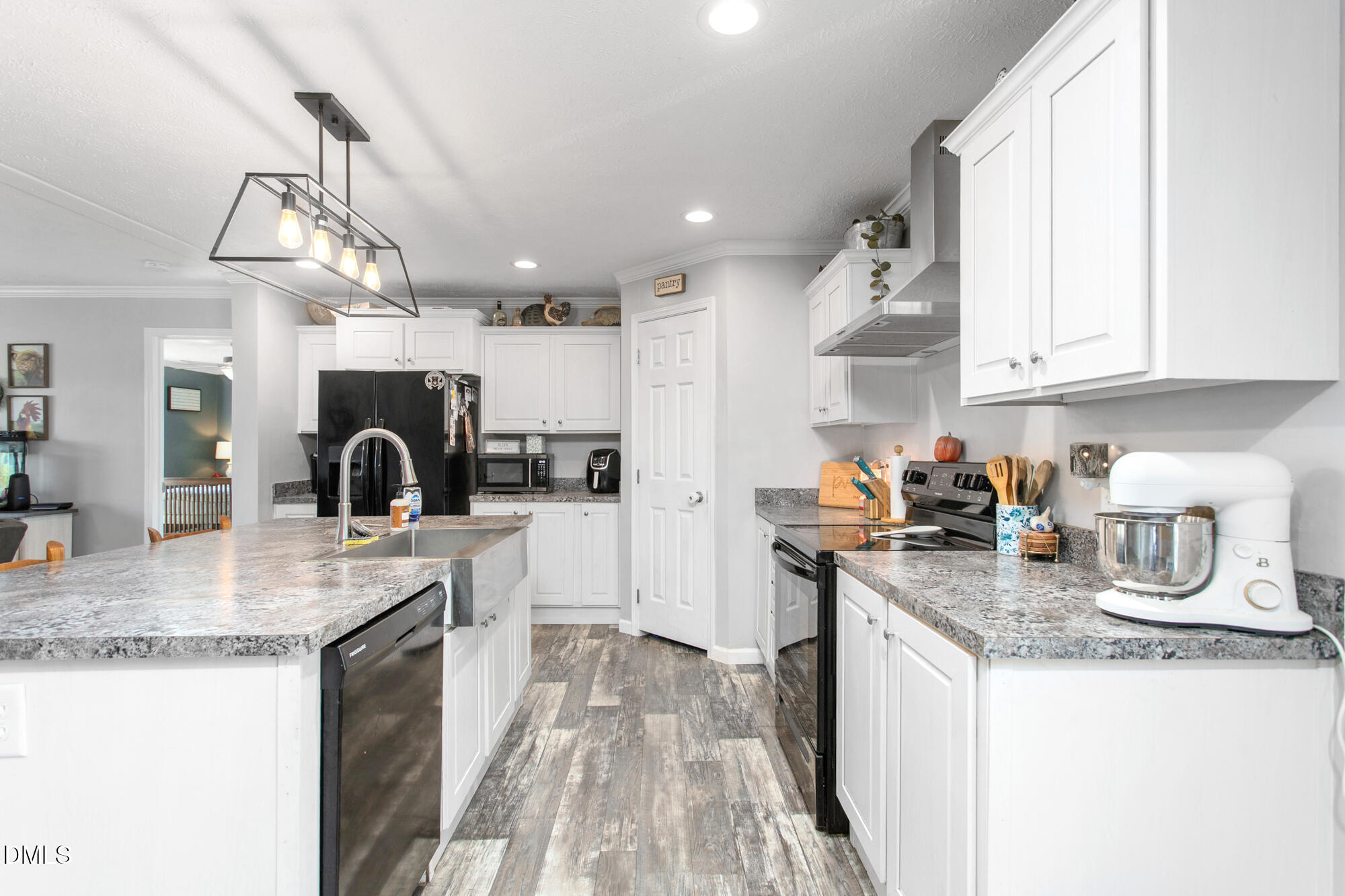578 Brintle Road Reidsville, NC 27320 - Photo 10 of 37 a kitchen with sink cabinets and stove