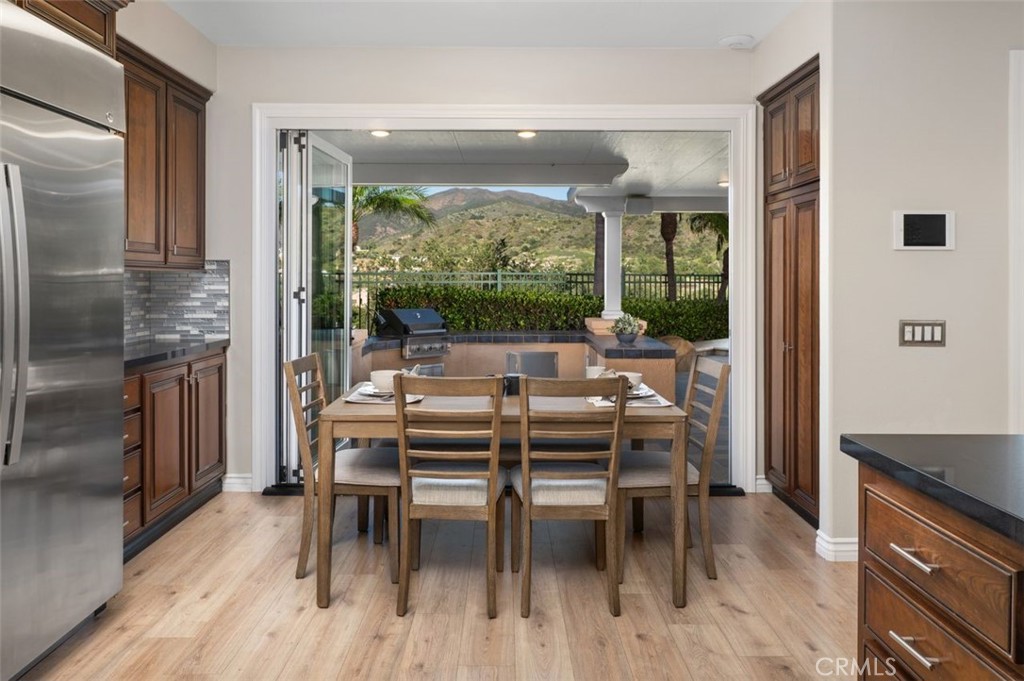 6 Beaconsfield Rancho Santa Margarita, CA 92679 - Photo 13 of 51 Kitchen nook has Views too. Stainless steel refrigerator is included
