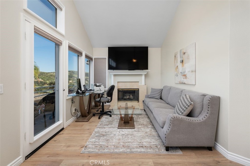 6 Beaconsfield Rancho Santa Margarita, CA 92679 - Photo 24 of 51 Primary bedroom with romantic fireplace to enjoy on cool nights